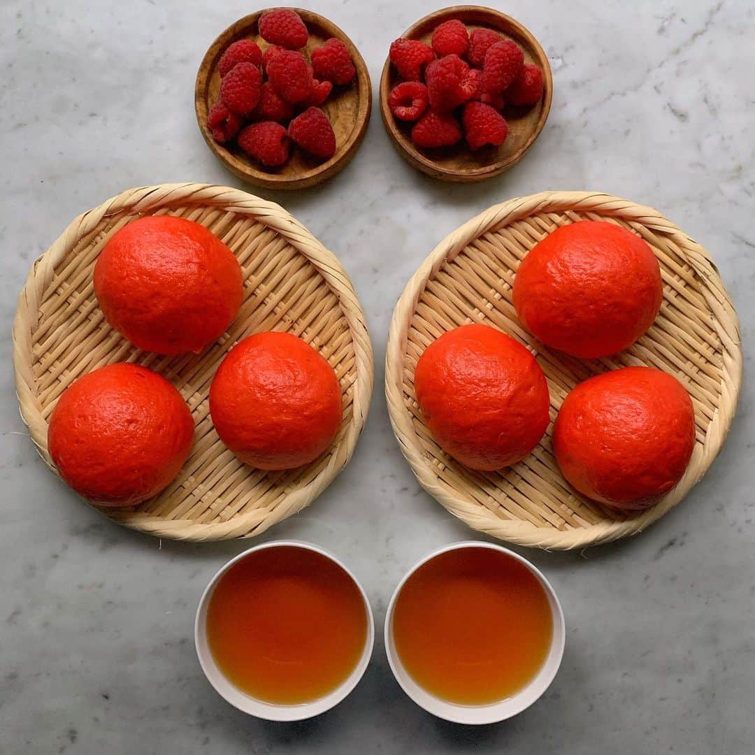 Symmetry Breakfastのインスタグラム：「❤️ Red Buns 红包子 ❤️ filled with red bean and gianduiotto, a very silky smooth chocolate from Piedmont, Italy. A healthy dose of red food dye went into the dough of these buns because I was slightly worried they’d come out pink 😂 Today is the 70th anniversary of the creation of the People’s Republic of China 🇨🇳 and whilst the celebrations are kicking off in Shanghai and the streets are festooned with flags, this years celebrations however are more complicated. I am very aware of events going on in Hong Kong 🇭🇰 right now, I personally support those fighting for their rights, protesting and marching for their future. There are always two sides to a story, to history, and it’s important to hear and understand both regardless of your leaning. 中国70周年快乐 加油香港 🥳 #symmetrybreakfast」
