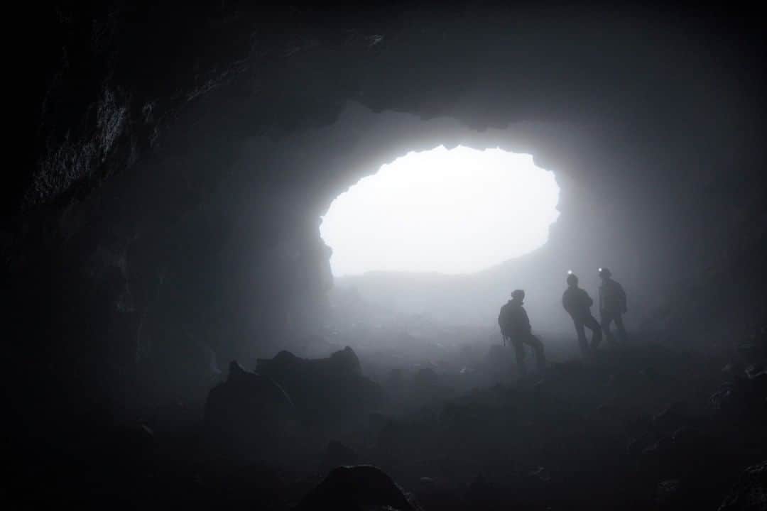 National Geographic Travelさんのインスタグラム写真 - (National Geographic TravelInstagram)「Photo by Robbie Shone @shonephoto | Outside swirling clouds and mist completely engulfed the summit of Mount Etna. Following a three-hour hike, we found refuge inside Grotta del Gelo (Ice Cave). Unfortunately we had to postpone our original plans to visit this remote lava tube because the volcano was erupting and a lava flow from the crater looked dangerously close to the entrance. With the support of the Sicilian Speleological Federation and in collaboration with Etna National Park, we shifted objectives around slightly and visited this lava tube the following day when it was safe.」10月8日 17時08分 - natgeotravel
