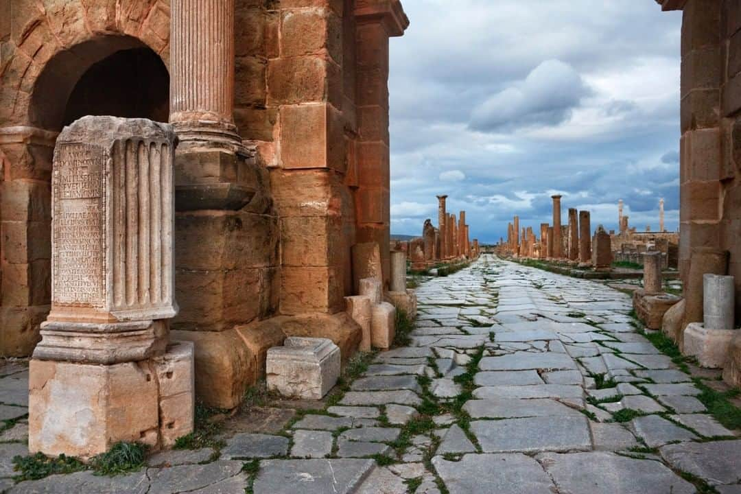 National Geographic Travelさんのインスタグラム写真 - (National Geographic TravelInstagram)「Photo by George Steinmetz @geosteinmetz | Walking through the deserted streets of Timgad, Algeria, on a stormy afternoon, you can sense the echoes of history. From the Latin inscriptions on the remnants of columns, to the ruts etched in stone by the wheels of the chariots that once drove through Trajan’s triumphal arch, the ancient world seems to come alive. To explore more of our world, follow @geosteinmetz.」10月9日 17時08分 - natgeotravel