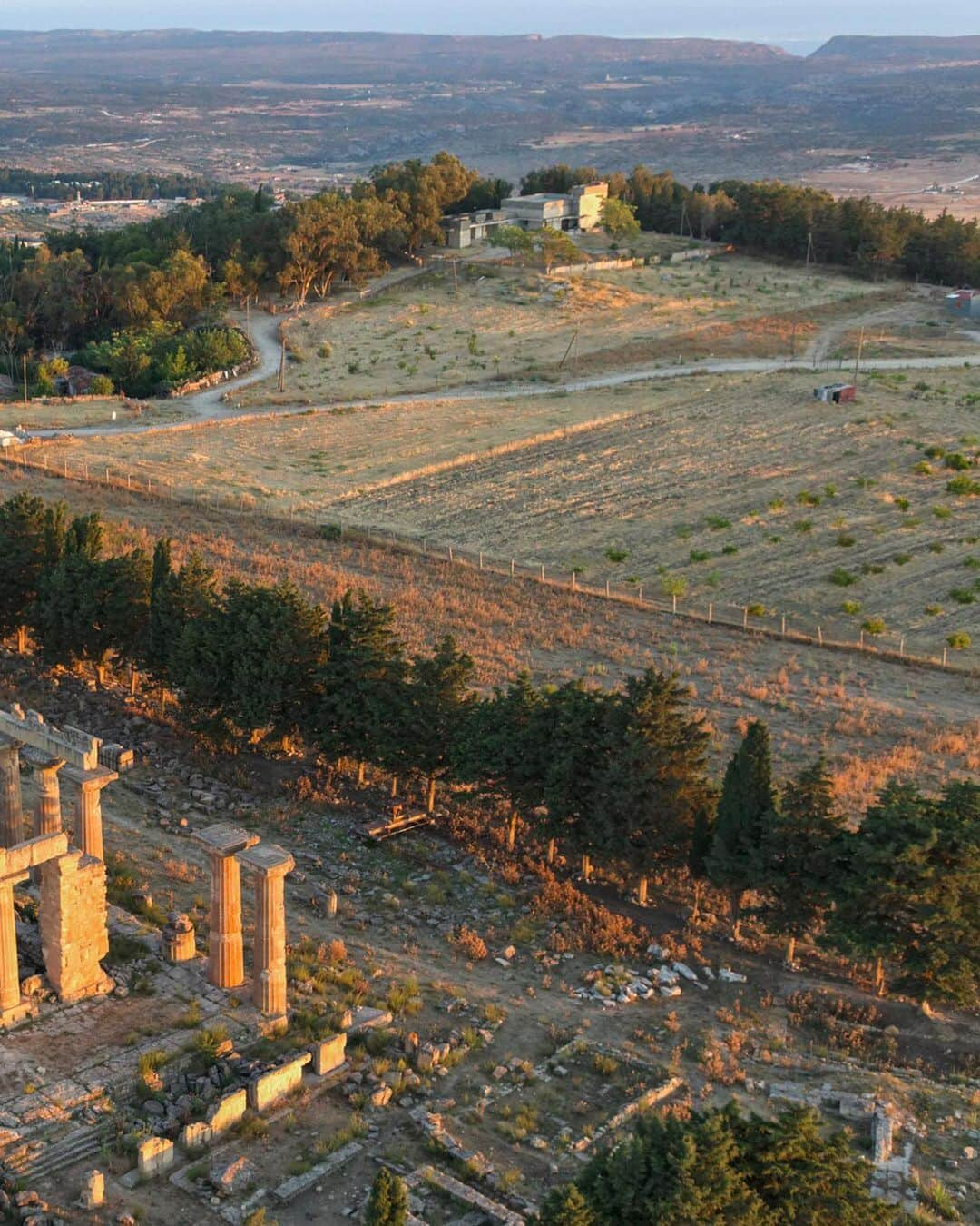 National Geographic Travelさんのインスタグラム写真 - (National Geographic TravelInstagram)「Photo by George Steinmetz @geosteinmetz | A rare aerial view of the Greek Temple of Zeus, which overlooks the Mediterranean from Cyrene, Eastern Libya. The city was founded in 700 BC as a Greek center of learning, and has been largely forgotten, except by the locals and a handful of dedicated international archaeologists. To explore more of our world from above, follow @geosteinmetz.」10月12日 1時10分 - natgeotravel