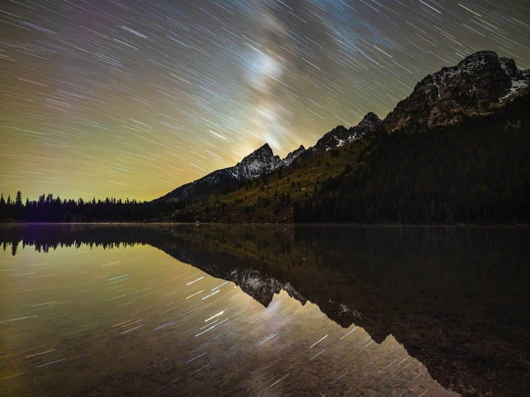 National Geographic Travelさんのインスタグラム写真 - (National Geographic TravelInstagram)「Photo by @michaelclarkphoto | Grand Teton stands under a swirling Milky Way, as seen from String Lake in Grand Teton National Park, Wyoming. #wyoming #stringlake #grandtetonnationalpark」10月13日 13時09分 - natgeotravel