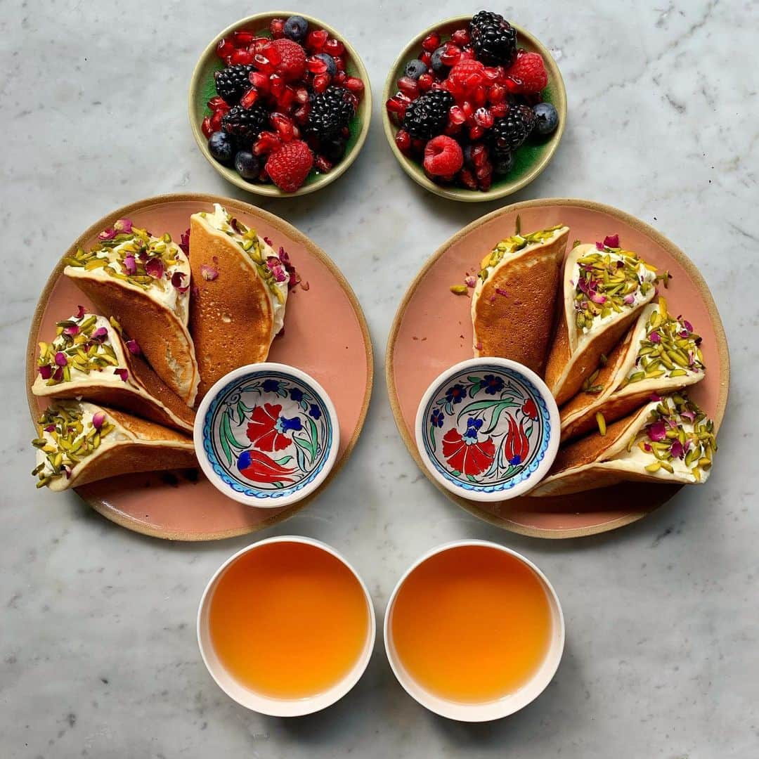 Symmetry Breakfastのインスタグラム：「Hey y’all, today I’m celebrating #WorldFoodDay in collaboration with @fao the department of the United Nations 🇺🇳 that looks at food and agriculture around the world. Today is about looking at what changes I can make to my diet, whether it’s cutting down on takeaways and cooking at home, to reducing single use plastics, or simply swapping white for brown rice in a way that’s sustainable and ultimately better for all of us. One of the biggest changes I’ve made in the last year is giving up beef and reducing the amount of meat I eat overall. I’m going to post a link in my stories to the @fao website for more details. - - - - - - - - - - - - - - - - - - Qatayef, these little pancakes are popular across the Levant, they look like little trumpets filled with a ricotta like cheese filling, pistachio, rose and drizzled with orange blossom syrup, the recipe is from my friend @palestineonaplate’s book #Baladi」
