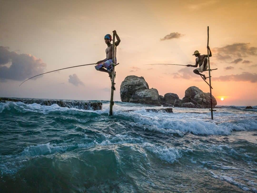 National Geographic Travelさんのインスタグラム写真 - (National Geographic TravelInstagram)「Photo by @coryrichards | Stilt fishing came into being in Sri Lanka just after World War II and was in wide practice up the coast until the 2004 tsunami. Due to the tsunami's wreckage of damaged coastlines, many stilt fishers were unable to utilize this method in catching fish. This reduced access to fish has made many fisherman transition into farming. Follow me @coryrichards more #culture, #adventure, and #travel from around the world.」10月17日 13時10分 - natgeotravel