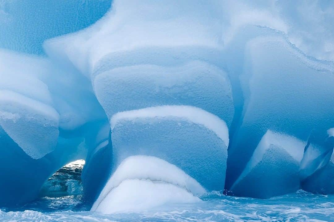 National Geographic Travelさんのインスタグラム写真 - (National Geographic TravelInstagram)「Photo by @DaisyGilardini | Ice is nice. That’s a fact. I simply love playing with its colors, shapes, and patterns. I can spend hours at a time poring over a sculpted block of ice like this one in Antarctica, always finding new details and abstractions. I find it’s a creative process that allows one to be focused on the task at hand and be in the moment. In our era of constant hyperactivity and multitasking, I find it refreshing to let my mind relax and focus on just one thing.  Follow me @DaisyGilardini for more images and stories behind the scenes. #iceberg #Antarctica #climatechange #climatechangeisreal」10月17日 17時08分 - natgeotravel