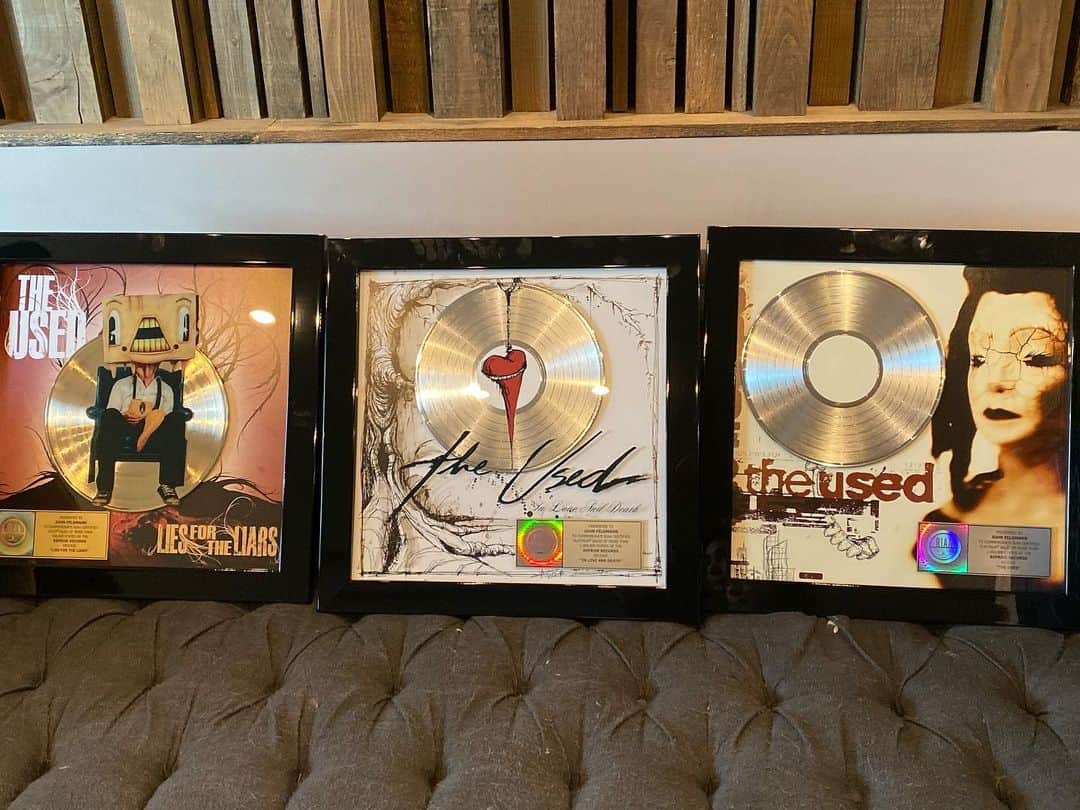 ジョン・フェルドマンのインスタグラム：「Thank you @theused for including me in this amazing journey.... you’ve changed my life forever. Bert @virtualjepha @brandensteineckert @quinstagram @dan.whitesides love you all. What a great surprise on a Sunday to get platinum albums for In Love and Death and the self titled.... AND a gold album for Lies For The Liars. Thank you Tom Whalley for taking a chance on these kids from Orem Utah and teaching me so much about this crazy music business. These are pictures from the making of these 3 albums. That’s me in London recording strings on an ancient Mac back in 2001 for Greener With The Scenery from the self titled. The other is recording vocals on the beach in San Simeon for Sound Effects and Overdramatics. The other beach shot is right after a writing session for The Bird and The Worm. The 2 shots from Foxy Studios v.2 on Roscomare Rd. were from the making of Lies For The Liars. I miss you Craig Aaronson. Thank you for believing. Brothers for life.」