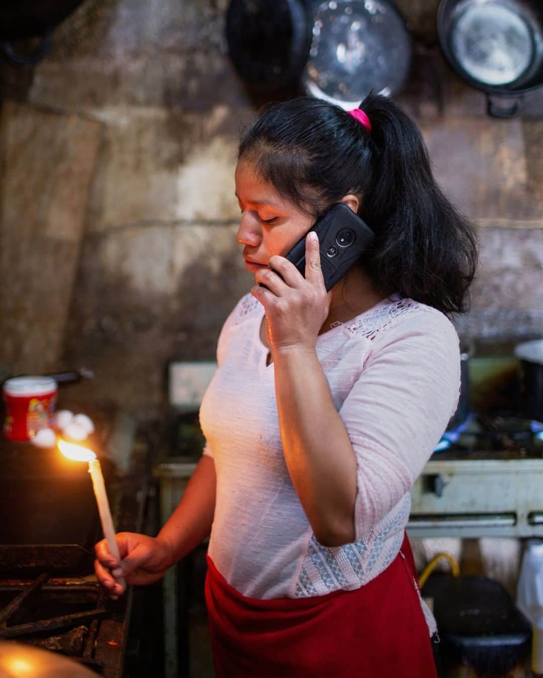 ナショナルジオグラフィックさんのインスタグラム写真 - (ナショナルジオグラフィックInstagram)「Photo by @nataliekeyssar | Eva Maria Escobar, a mother, restaurant manager, cook, activist, and politician, lights the stove in the restaurant she runs with her family. She has been separated from her youngest son, Benjamin, ever since she tried to bring him back to the U.S., where he was born. Because the child is a citizen, he was allowed to stay in the country with relatives, but she was deported to Guatemala.  Eva Maria Escobar and her husband immigrated to the U.S. when they were young, and three of their four sons were born there. After her husband's deportation, they moved the family back to Guatemala, but due to economic necessity, they eventually decided that Eva Maria should return to the U.S. for work, with Benjamin. At the border they were separated, and Benjamin was released to relatives in Georgia, while Eva Maria was incarcerated for six months before being deported back to Guatemala. She and her husband are now both leaders in local government. Her three sons still in the U.S. study hard and help out in the "comedor" they run to help supplement their income. She is deeply pained by the absence of her youngest son, but tries to comfort herself by hoping that his future in the U.S. will be better than what is available in Guatemala.」11月16日 22時37分 - natgeo