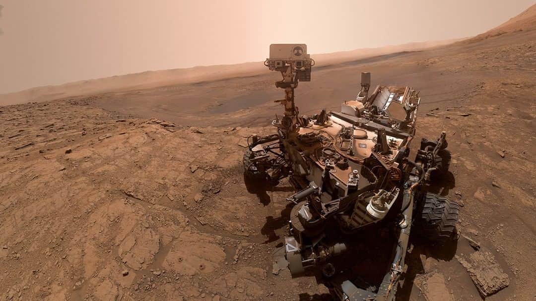 NASAさんのインスタグラム写真 - (NASAInstagram)「🧭 Explorer, 📸 photographer, ⛰️ geologist, 🧪 chemist... Mars Curiosity does it all!⁣ ⁣ The rover captured images on Oct. 11 for this celebratory #selfie, after its second-ever "wet chemistry" experiment using solvents to help its portable laboratory detect certain carbon-based molecules important to the formation of life, called organic compounds. ⁣ ⁣ About 984 feet (300 meters) behind the rover is Vera Rubin Ridge, which Curiosity departed nearly a year ago. Beyond the ridge, you can see the floor of Gale Crater and the crater's northern rim. Curiosity has been ascending Mount Sharp, a 3-mile-tall (5-kilometer-tall) mountain inside the crater.⁣ ⁣ The individual images in this selfie were taken by the Mars Hand Lens Imager (MAHLI), a camera on the end of the rover's robotic arm. The images are stitched together into a panorama; the robotic arm isn't visible in the parts of the images used in the composite.⁣ ⁣ Image Credit: NASA/JPL-Caltech/MSSS⁣ ⁣ #mars #rover #solarsystem #nasa #chemistry #robots」10月26日 6時00分 - nasa