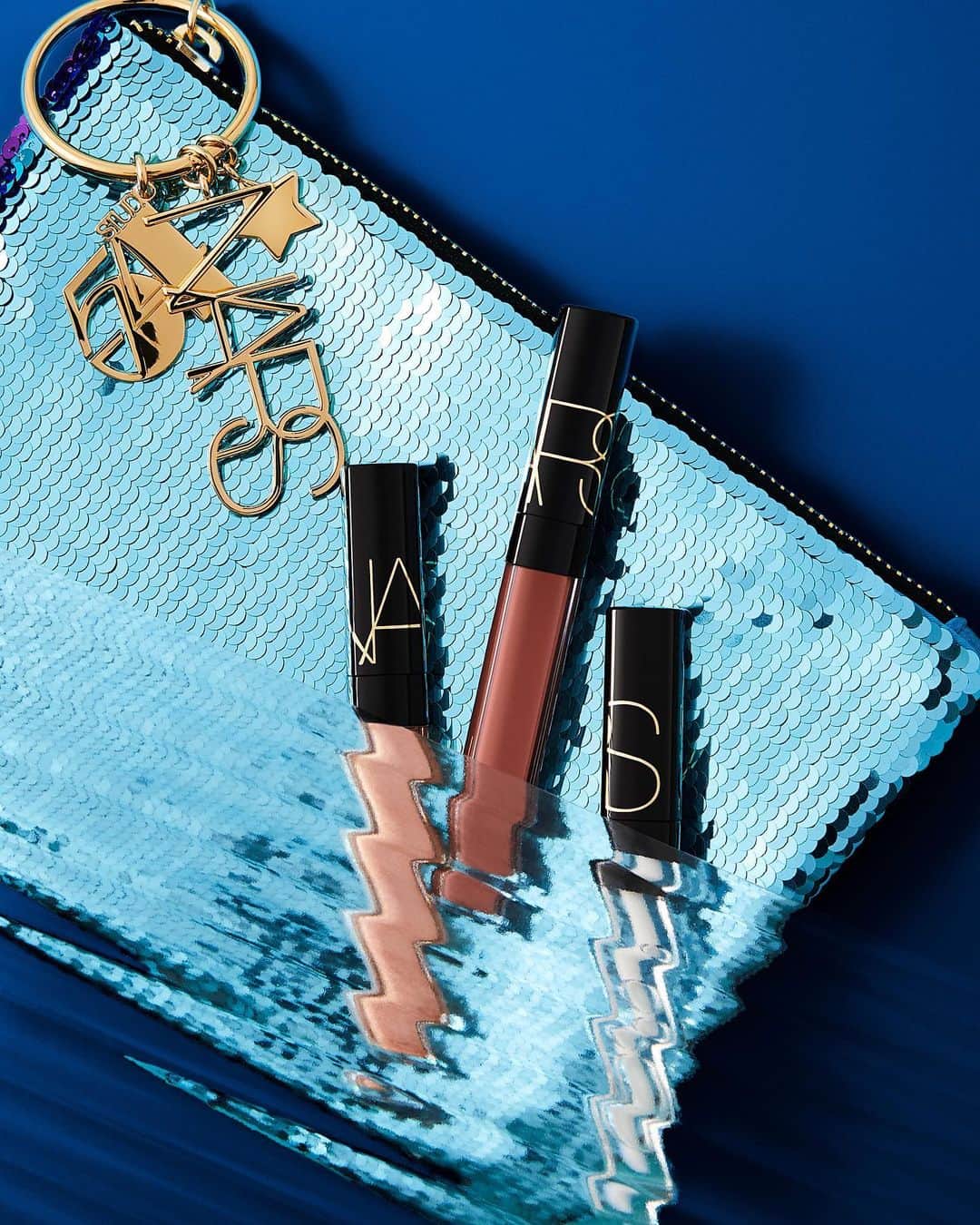 NARSさんのインスタグラム写真 - (NARSInstagram)「Your time to shine. Glisten up with a limited-edition trio of cult-favorite Lip Gloss. Featuring translucent Triple X, nude Star Love, shimmery On the Radio, and an exclusive sequin Studio 54 pouch.」10月26日 23時02分 - narsissist