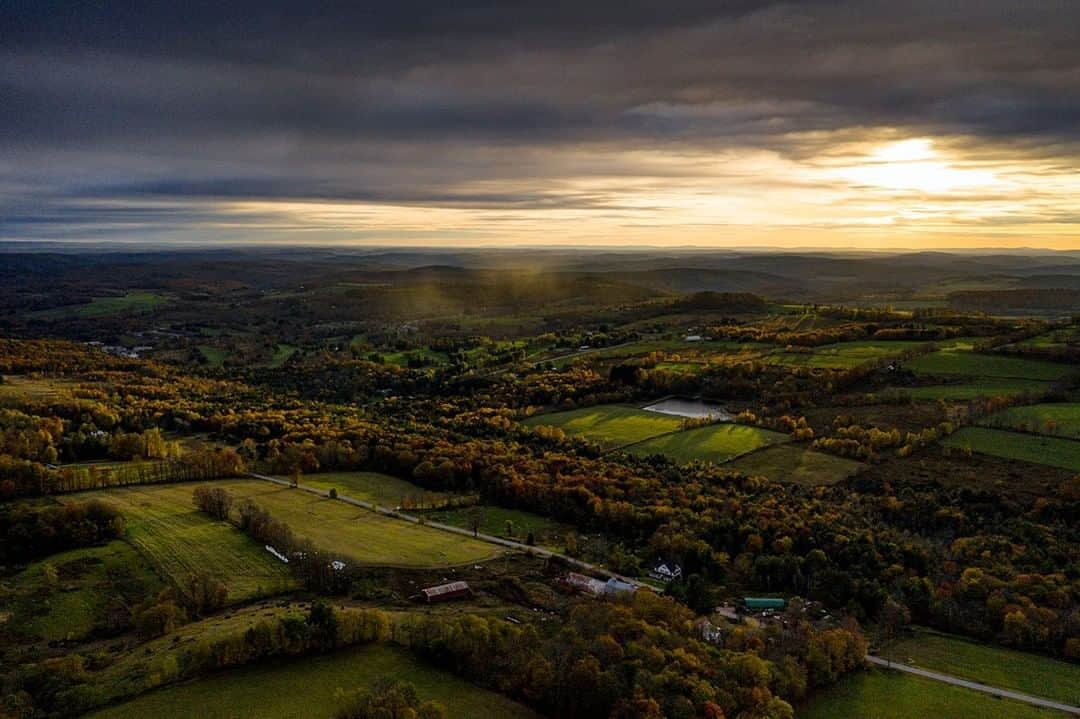 National Geographic Travelさんのインスタグラム写真 - (National Geographic TravelInstagram)「Photo by Matt Borowick @mborowick | A beautiful sunset casts a glow over the rolling hills of Jeffersonville, New York. Autumn has only just begun to turn the colors of the trees in this small town about two hours from the hustle and bustle of New York City. #autumn #fall #newyork #roam #sunset」10月28日 5時05分 - natgeotravel