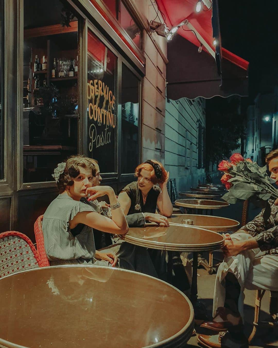 Putri Anindyaのインスタグラム：「Midnight in Paris // i know, it sounds like a Woody Allen movie. I know, it’s a little bit cliché title. But this moment wasn’t too much special or important. This is the moment when I pretend to have a selfie but actually I took pictures of her with my phone. I also know this sounds impolite but her looks that night was fabulous. I guess she just came back from a 50s costume party. This photo also brings back my memory of a karaoke night with my friends in Paris. But @capra311 and @misscoolpics accompanied my last wine in the evening in Paris last summer. Just 18 hours before my flight to Indonesia. In the end, it’s quite a special moment.」