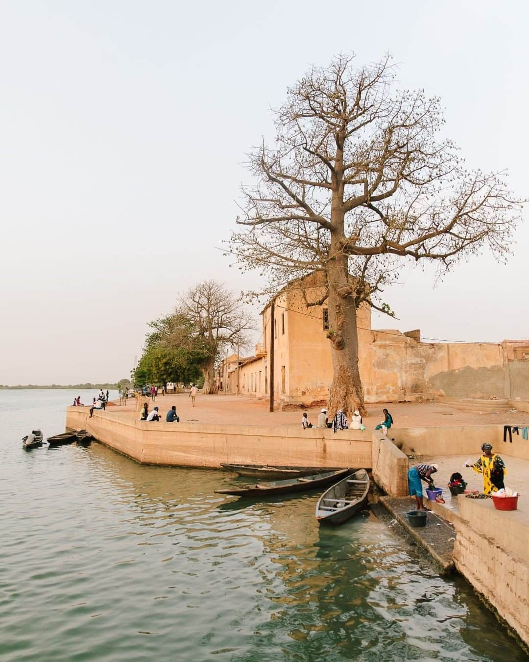 National Geographic Travelさんのインスタグラム写真 - (National Geographic TravelInstagram)「Photo by @kevinfaingnaert | On the banks of the Senegal River, the harbor town of Dagana has a rich colonial past due to its location as a stopover city along the river. It was a central region that saw the first kingdoms, the Islamization, and the colonization by the French. Navigating down the river’s meanders, travelers will meet the kind and interesting population from the villages along its banks. #senegal」10月30日 5時10分 - natgeotravel