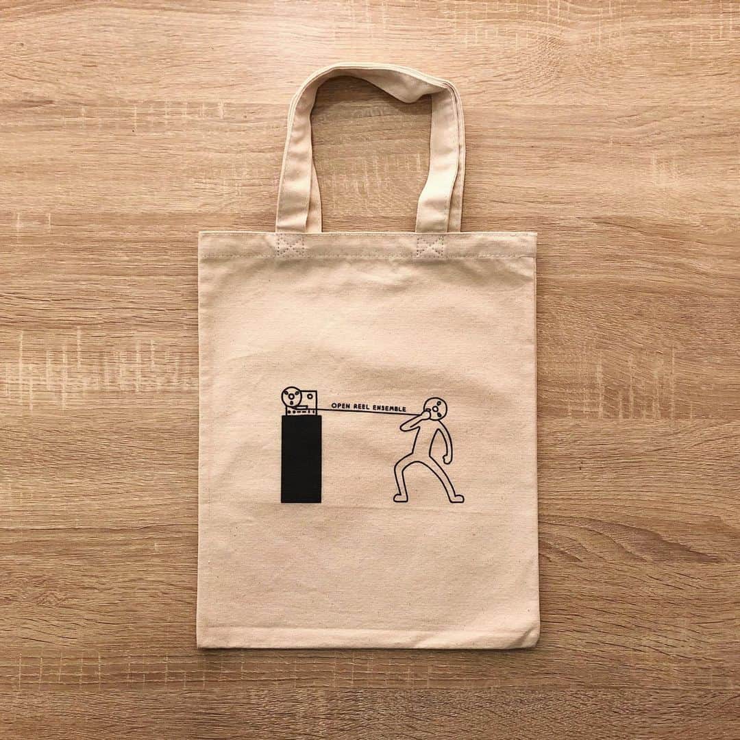 Open Reel Ensembleのインスタグラム：「✇新グッズ発売✇﻿ OREの新しいグッズ「"Mr.TAPE"トートバッグ」が無事に完成しました！本日、ずっと真夜中でいいのに。大阪公演 物販コーナーにて販売中です。﻿ ﻿ - ﻿ ✇NEW_ARRIVAL✇﻿ Our new illustration totebag is now on sale!﻿ ﻿ Hello, "Mr.Tape".﻿ ﻿ ﻿ #openreelensemble #mr_tape #ずとまよ #潜潜ツアー #秋の味覚編 #reeltoreel #tape #illustration #totebag」