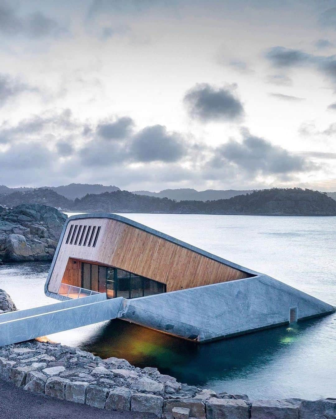 Architecture - Housesさんのインスタグラム写真 - (Architecture - HousesInstagram)「Europe’s first underwater restaurant designed by @snohetta  #Lindesnes, #Norway .  #restaurant #design #concrete #europe #architecture #modern #designer #idea #exterior #architect #luxury #awesome #project #render #arquitectura #projects #wood #material #minimal #lake #ramp #3d」10月30日 22時39分 - _archidesignhome_