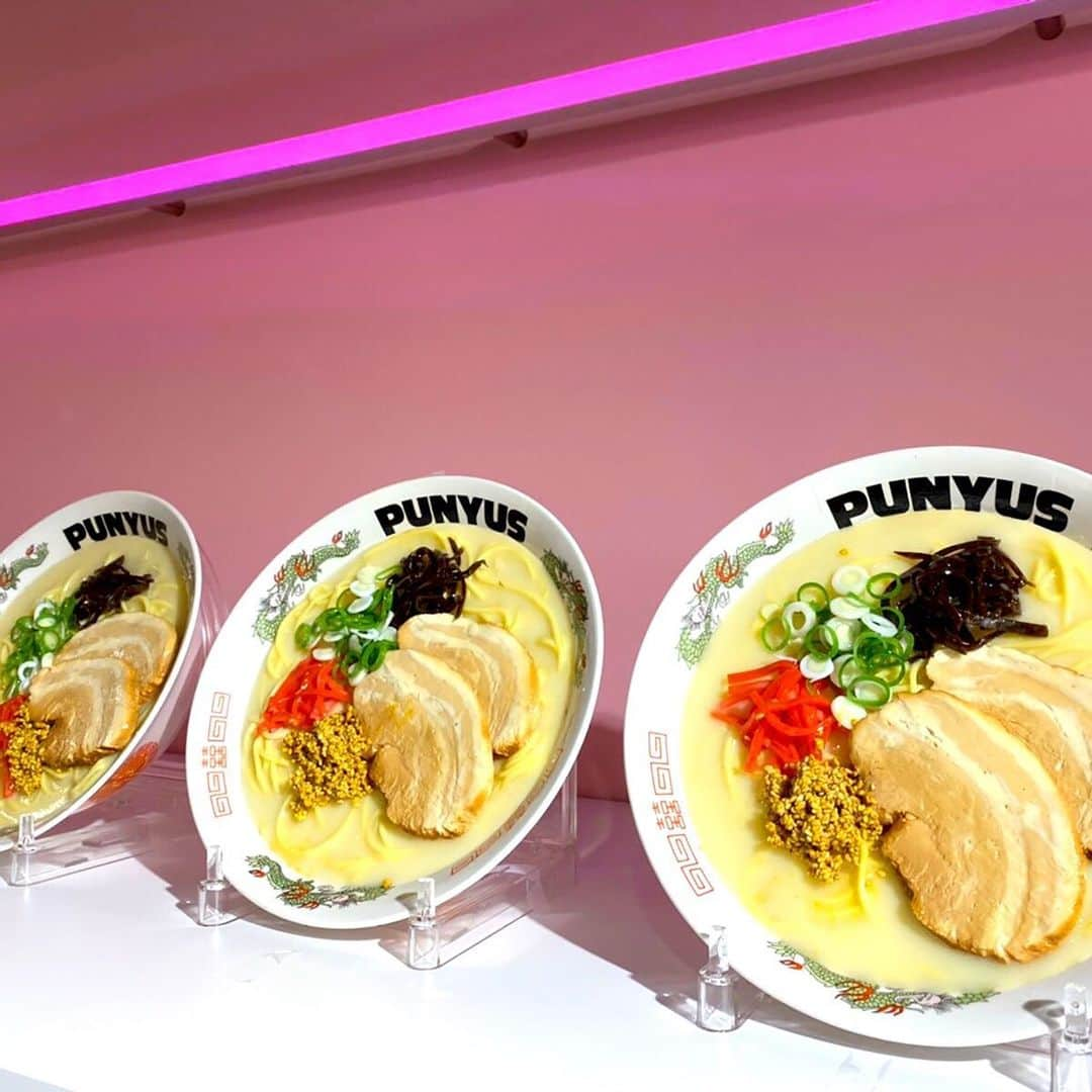 PUNYUSさんのインスタグラム写真 - (PUNYUSInstagram)「. PUNYUSキャナルシティオーパ店(博多) ㊗️NEW OPEN㊗️ . 限定アイテム『もつ鍋総柄スウェット&ショーパン』 『もつ鍋スマホリング』発売🍲👀🎵 . ￥10,000(税込)以上お買い上げの方に限定ノベルティ 『もつ鍋モバイルバッテリー』プレゼント🔌🎁 . 博多らしいイラストにピンクのネオンの店内💗✨ ぜひご覧ください🚶‍♀️🎵 . . 🍜豚骨ラーメンはディスプレイです🍜 --------------- ●PUNYUSキャナルシティオーパ店 福岡県福岡市博多区住吉1-2-22 キャナルシティオーパ 2階 .  #punyus #プニュズ #ぷにゅず #watanabenaomi #渡辺直美 #fashion #japanfashion #look #streetfashion  #canal #canalcity #キャナルシティ #博多 #福岡 #newopen #SHIBUYA109 #スカイツリー #ルミネエスト新宿 #横浜ジョイナス #あべのキューズモール #ルクア大阪 #名古屋パルコ #札幌パセオ #ZOZOTOWN #ONLINESHOP #internationalshipping」11月1日 17時56分 - punyus