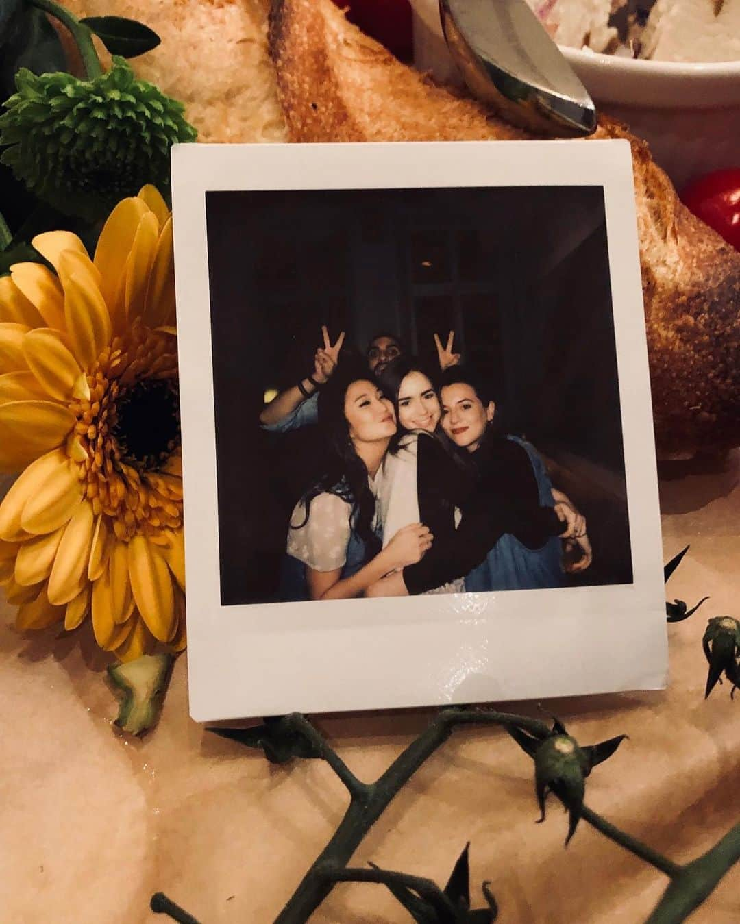 リリー・コリンズさんのインスタグラム写真 - (リリー・コリンズInstagram)「What a picture perfect way to say au revoir to my @emilyinparis sister. Leave it @ashleyparklady to wrap up filming with the sweetest (and most savory) send off. The show may have brought us together but now, we have each other for life. I’m going to miss you so much. Emily is Emily because of you...」11月2日 7時58分 - lilyjcollins