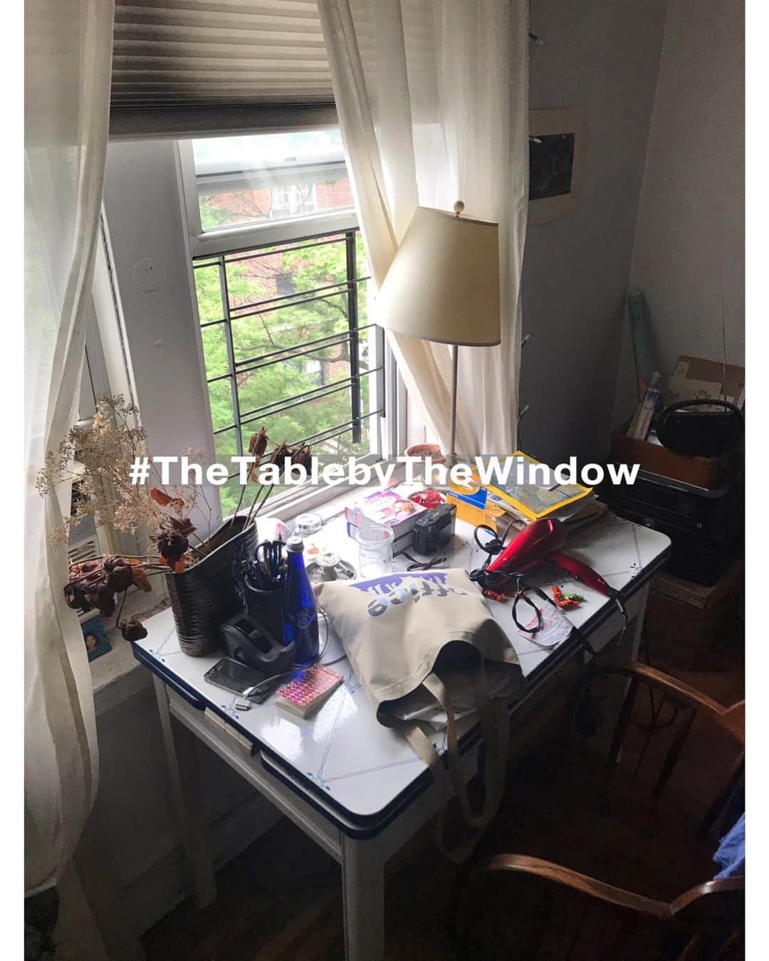 shinichitsutsuiのインスタグラム：「@TheTablebyTheWindow: An antique tin table with flower design on it placed by a window in a room  #TheTablebyTheWindow」