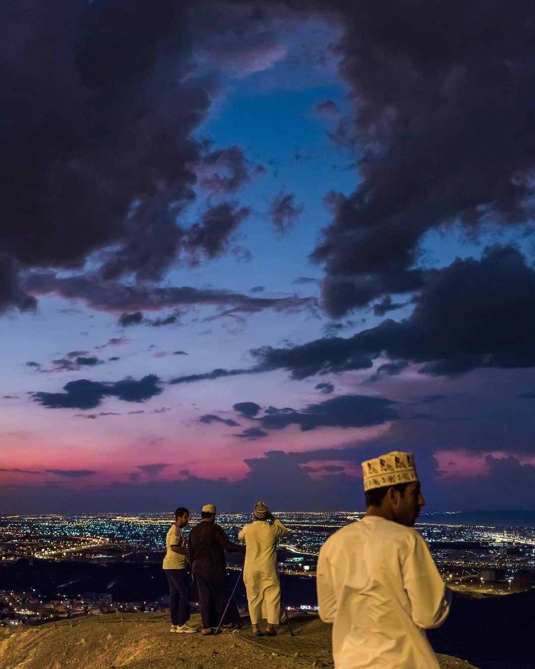 National Geographic Travelさんのインスタグラム写真 - (National Geographic TravelInstagram)「Photo by @BabakTafreshi | Swipe slowly to see the entire view of this evening twilight over the coastal city of Muscat, with skies clearing after a stormy day. With about 1.5 million residents, Muscat is home to a third of Oman's population. #nightphotography #oman #muscat #middleeast」11月12日 2時07分 - natgeotravel