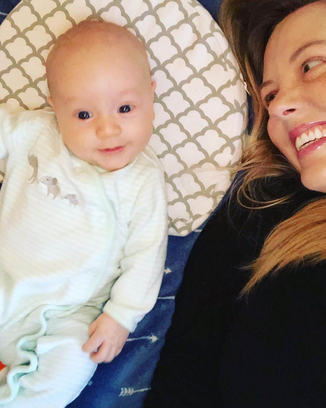 のインスタグラム：「Life has slowed down.  Baths, giggles, smiles, sounds, touches, hugs, snuggles, sunlight, walks, stories- everyday and everything is new to him- and has become new to me.  This simplicity-this joy-this juicy unknowing-this is it. I woke before dawn, as I often do now, I looked at my simple sanctuary- a muddy, snoring Labrador, a husband dreaming, and the smallest little soul cooing on my chest. “Oh,” I thought, “this is why people pray-this is where the goddess/god lives. *This* is Eden.” We are slowly coming out of our cocoon- forgive us if we’ve been absent - we will return those texts and voicemails and emails.  We have felt your 💕. 🙏.」