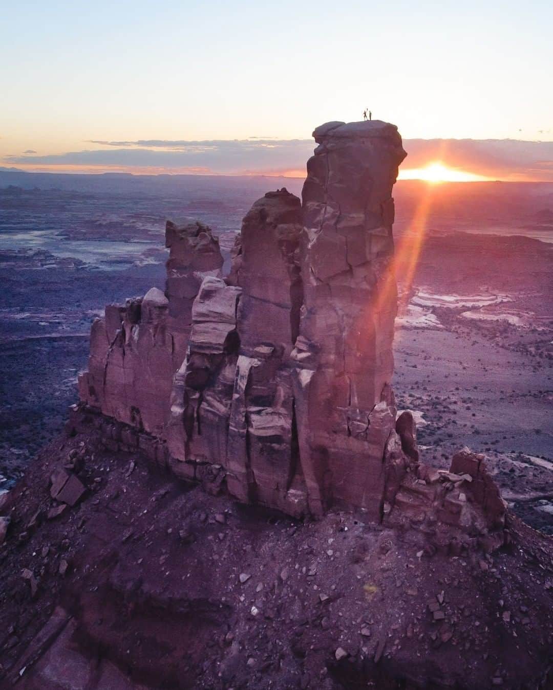 National Geographic Travelさんのインスタグラム写真 - (National Geographic TravelInstagram)「Photo by @renan_ozturk | A cowboy and a climber stand atop the North Six Shooter tower in the northern end of Bears Ears National Monument, Utah. It's easy to see why this land is so hotly contested between Native Americans, ranchers, climbers, extractive industries, and others. I hope that sharing images of it and inviting more people to travel here responsibly will help forge the best path forward. Follow @renan_ozturk for more from Bears Ears.」12月11日 14時10分 - natgeotravel