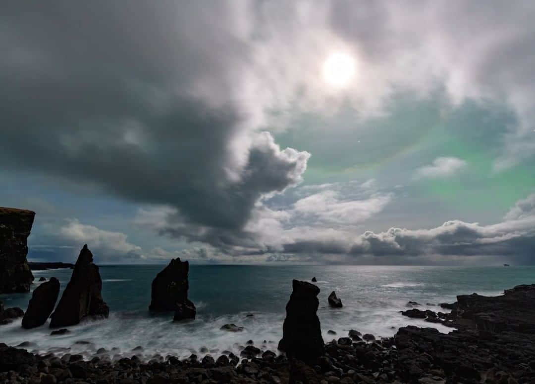 National Geographic Travelさんのインスタグラム写真 - (National Geographic TravelInstagram)「Photo by @BabakTafreshi | The southwestern coast of Iceland glows in a moonlit midnight. As my workshop group was waiting for the northern lights, the atmospheric phenomenon known as a 22-degree halo formed around the moon due to refraction of moonlight by ice crystals in the high cirrus clouds. #twanight #nightscapes #nightphotography #atmospheric #iceland」12月12日 10時05分 - natgeotravel