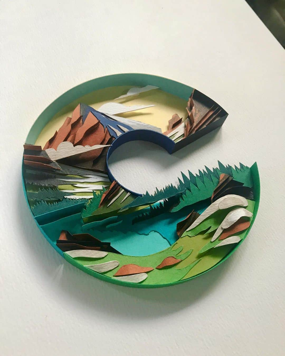 Sabeena Karnikさんのインスタグラム写真 - (Sabeena KarnikInstagram)「C for ‘Colorado’ 🌲  My interpretation of the Colorado state logo with evergreen trees, Rocky mountains, snow, blue waters and the iconic letter C . . I spent 2 weeks in this magical place last month with my sister @sonkya1010 and soaked in some of the most spectacular sights. . . I’m planning to update my store soon with new artworks which you can purchase before Christmas.」11月20日 23時45分 - sabeenu