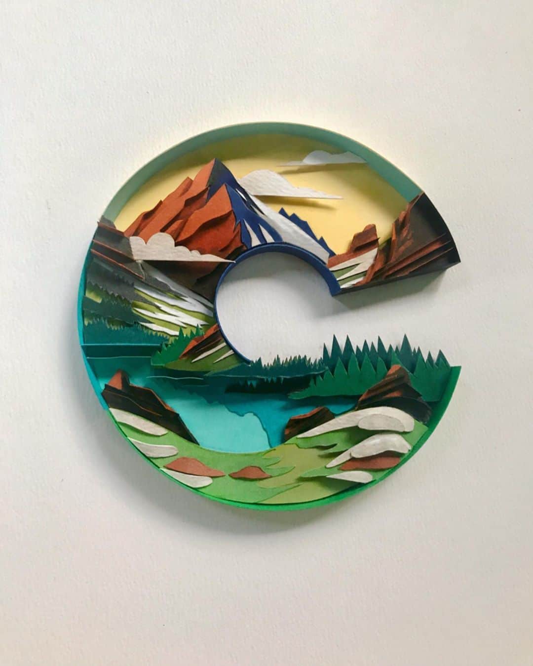 Sabeena Karnikさんのインスタグラム写真 - (Sabeena KarnikInstagram)「C for ‘Colorado’ 🌲  My interpretation of the Colorado state logo with evergreen trees, Rocky mountains, snow, blue waters and the iconic letter C . . I spent 2 weeks in this magical place last month with my sister @sonkya1010 and soaked in some of the most spectacular sights. . . I’m planning to update my store soon with new artworks which you can purchase before Christmas.」11月20日 23時45分 - sabeenu