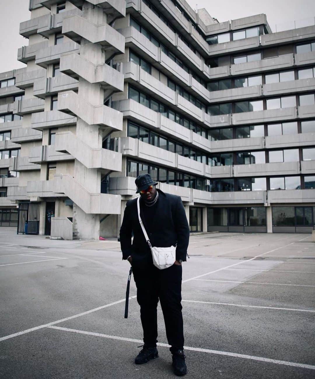 のインスタグラム：「@hunchokartierlovely Shot by @yasin.gocer - He’s wearing our The Drops in an all white colorway ❄️ • • • • • #georgeginalucy #gglsquad #streetwear #streetstyle #menswear #outfit #hypebeast #highsnobiety #snobshots #35mm #photography」