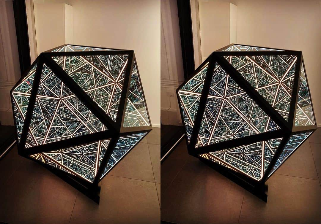 ブライアン・メイさんのインスタグラム写真 - (ブライアン・メイInstagram)「Icosahedron !  This 20-sided polyhedron is one of Nature’s (only) 5 regular solids.  I’ve put the whole set on swipe position number 4.  This particular giant internally lit icosahedron is made by artist Anthony James.  The internal reflections make a fantastic 3-D tracery inside the space it occupies, which seem to stretch to infinity.  Swipe for 3 parallel 3-D views, and then the key to regular polyhedra, and the gallery, then the cross-eyed views. Yes, I’m feeling geeky tonight. Or maybe this stuff is a convenient escape from the difficult stuff of real life.  Thanks to the Opera Gallery in London - where you can see this piece today. 💥💥💥💥 Why do I have all this stuff in my head, you ask ? I was fascinated by solid geometry when I was a kid - and I made these regular solid objects as Christmas decorations. I’m sure I still have them somewhere ... Bri. Acknowledgments to Tutors.com for the illustrations.」11月22日 13時01分 - brianmayforreal