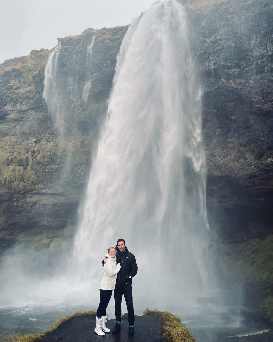 コリン・ドネルのインスタグラム：「In front...(swipe)...Behind • Photo and unbelievable experience courtesy of our new friend Jón (@nonni_gud ) • Exploring with the best aka @pattimurin • #Iceland #LoveOnIceland #Waterfall」