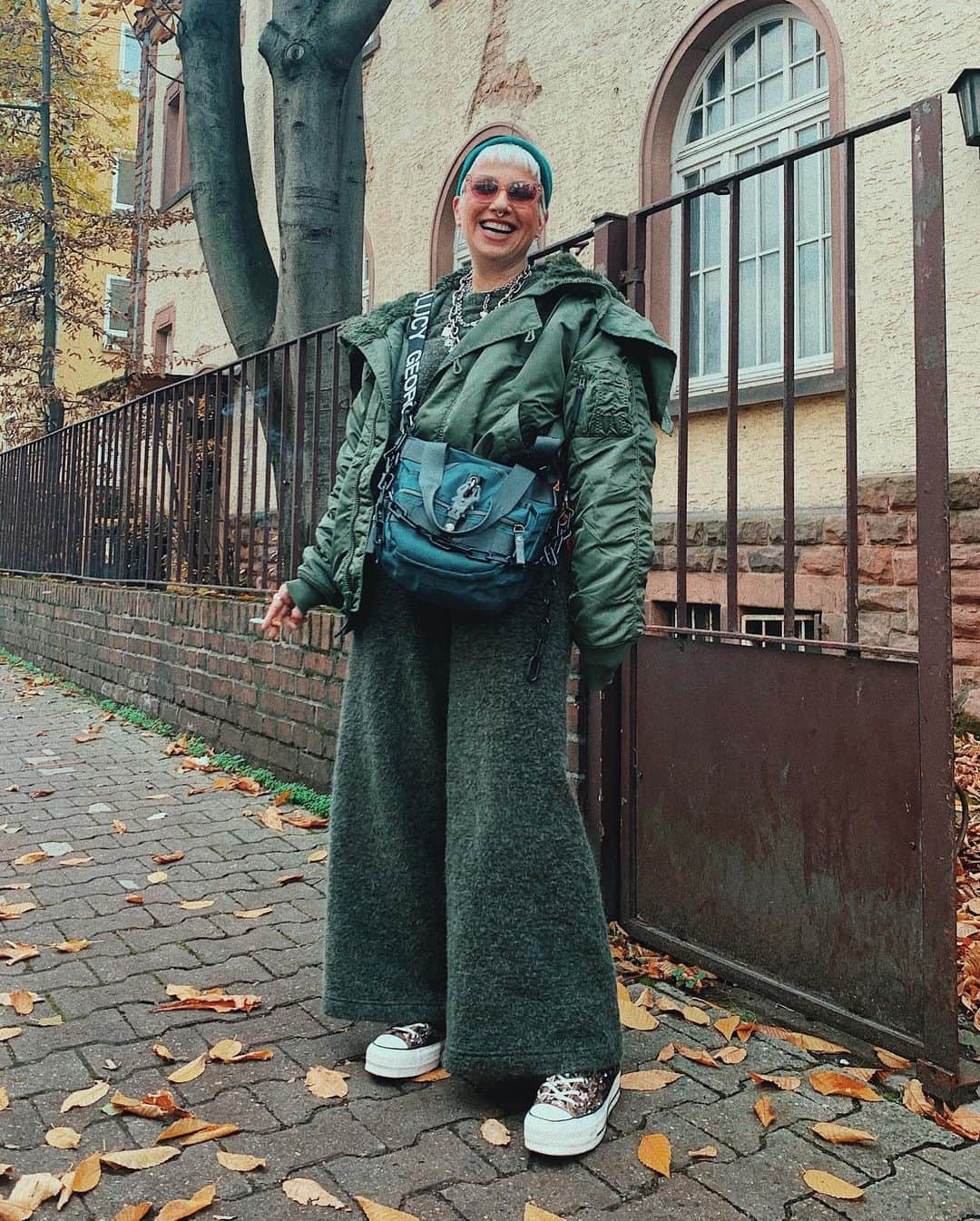 のインスタグラム：「Our designer @yvon_sunlight_ rocking the “Miss Mini Piece” and an insane jacket by our friends from @alphaindustries_europe ⛓💚 • • • • • #georgeginalucy #gglsquad #bag #accessoires #streetwear #streetwearfashion #streetstyle #outfit #autumn #frankfurt #highsnobiety #hypebeast #hypebae #outfitinspiration #simplefits #alphaindustries #35mm」