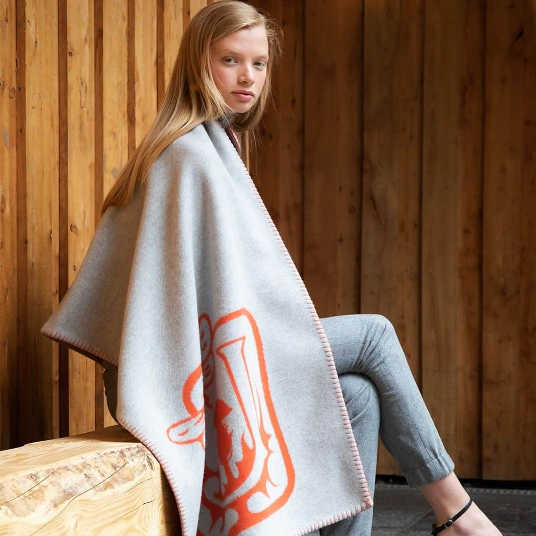 Johnstonsさんのインスタグラム写真 - (JohnstonsInstagram)「Our merino & cashmere blend grey stole features the Johnstons of Elgin bee logo in burnt orange - a statement piece to keep you warm this Winter. The original Johnstons of Elgin illustration tells the story of how our Scottish family business became one of the finest textile manufacturers in the world. The J represents the name Johnston and our core values established in 1797. In 1920 the ownership transferred from the Johnston family to Edward Harrison and it is his family who continue as custodians today. The Thistle represents Scotland, the home of our two mills in Elgin and Hawick. We take fine natural fibres through every stage of the process to make our finished pieces. We are the only manufacturer in Scotland with this capability. The Bee is the symbol of our craftsmen and women, who use the latest technology, alongside skills passed down through generations, to make every Johnstons of Elgin piece a timeless classic. The illustration was created in the 1930s by Edward Harrison. Edward was an accomplished textile designer and painter who joined Johnstons of Elgin in 1904.」11月25日 1時24分 - johnstonsofelgin