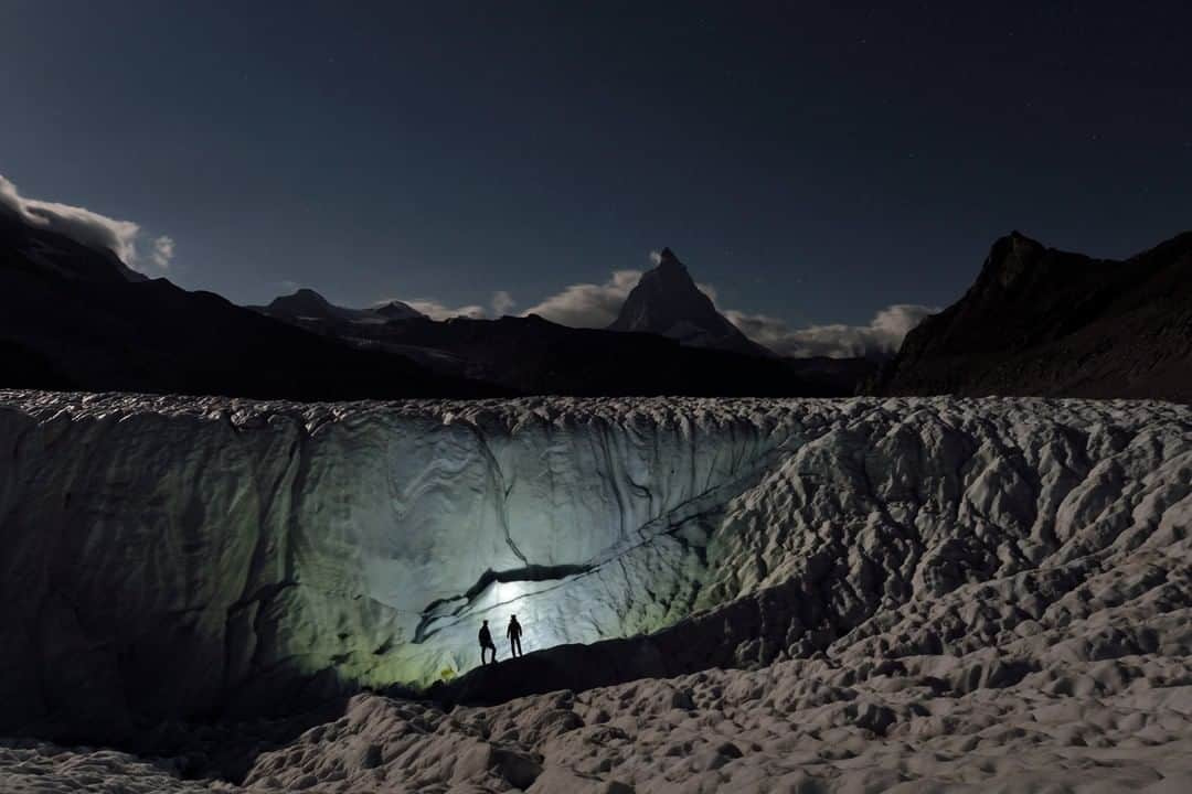 National Geographic Travelさんのインスタグラム写真 - (National Geographic TravelInstagram)「Photo by Robbie Shone @shonephoto | Explorers scour the surface of the Gorner Glacier in Switzerland in search of holes that might lead them down through the ice. In the middle of the night, when temperatures drop below freezing and there is no meltwater to worry about, these moulins and glacier caves are safe to enter. @NatGeoImageCollection」11月25日 2時06分 - natgeotravel