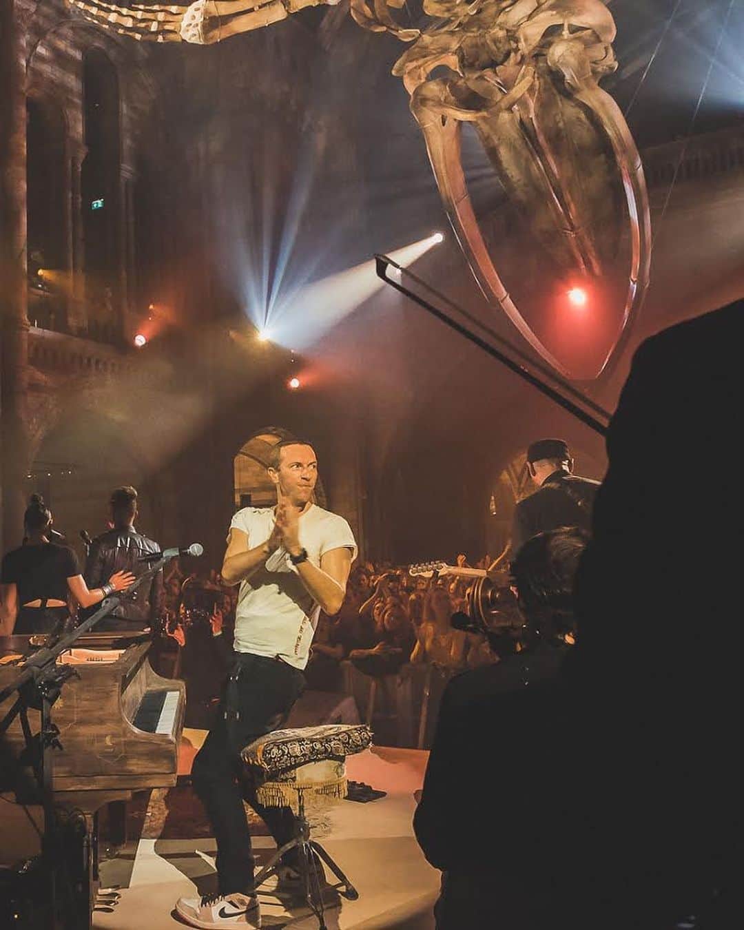 Coldplayさんのインスタグラム写真 - (ColdplayInstagram)「There’s a mere few hours between the Natural History Museum being in its day to day layout, full of the general public - and later when its been fully transformed into a gig, complete with lights, stage, sound system and band gear (including seven foot grand piano!).⁣ ⁣ The intervening time is possibly the most bonkers load-in I’ve ever been part of in all my years of roadie-ing. There’s seemingly hundreds of folks yelling, a PA system belching blasts of white noise and poor old Jose trying to tune the piano in amongst it all.⁣ ⁣ It’s very much like trying to build a house of cards on top of a hyperactive tumble dryer with a giant countdown timer strapped to your eardrums. ⁣ ⁣ It’s a very Coldplay thing really, when what should be a disaster coalesces into something truly sublime. I’m told the show was beautiful, powerful and even “perfect”. ⁣ ⁣ Me - I’ve no idea. I’m still recovering…. R42 (@millerworld)」11月27日 1時52分 - coldplay