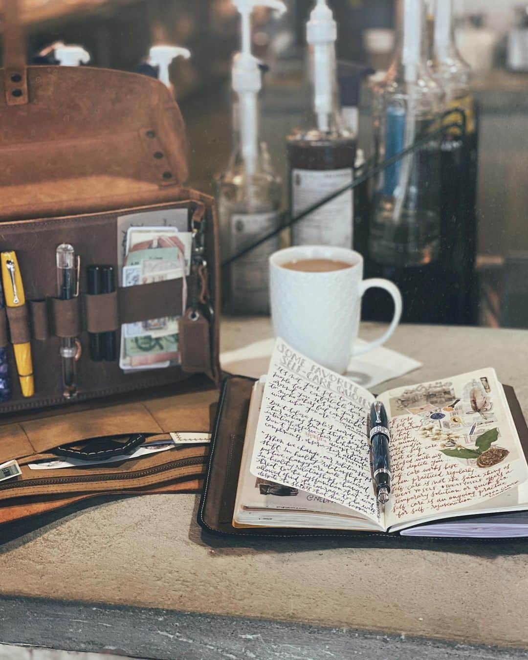 Catharine Mi-Sookさんのインスタグラム写真 - (Catharine Mi-SookInstagram)「Enjoying some quiet time at the local cafe with a hot mug of rooibos chai tea and a few of my favorite accoutrements. I started a weekly self-care #bulletjournal a few months ago and it’s such a wonderful resource to flip through especially during the holiday season, which is admittedly one of my favorite times of the year, as the kid in me still finds it so magical and wondrous, and yet it’s also the most hectic (aka I feel up to my eyeballs with work, projects and family schedules) and bittersweet (missing my dad) too. I’m being intentional this year with carving out more room for self-care, honoring my own boundaries and pausing in the midst. I want to savor the joyous moments and let them be the momentum that girds all else. I know the holidays can be a mixed bag for many, so my wish is that somehow that which brings you warmth and joy finds you extra this year. From my heart and mug to yours, cheers. ♥️☕️ . . . Featuring the @montegrappaitalia Miya 450, a very limited edition and celluloid beauty with sterling silver trim and a 14k gold nib offered at an introductory discount at @penchalet through the link in my bio or penchalet.com/cmisook. . Also featuring the Writer’s Medic Bag by @galen_leather and the last design of their founder (and beloved friend) Zeynep. It’s now available on their site with an introductory discount! The best time to snag one if you can! . TN Notebook @soumkine. Personalized Vagabond Notebook in Umber waxed canvas co-designed by @franklinchristoph & myself. . . . Pen & bag were gifted to me by the brands. . . . #journaling #selfcaredaily #selfcarematters #montegrappaitalia #montegrappapen #penchalet #fountainpens #penmanship #galenleather #writingbox #leatherhandbag #whatsinmybag #franklinchristoph #loveforanalogue #vagabondnotebook #soumkine #travelersnotebook #bujoideas #bujojunkies #bulletjournalideas #bulletjournaljunkies #planneraddict #bulletjournalweekly #stationerylover #stationeryaddict #thedailywriting #coffeeshopvibes #scrapbooking」11月28日 0時18分 - catharinemisook