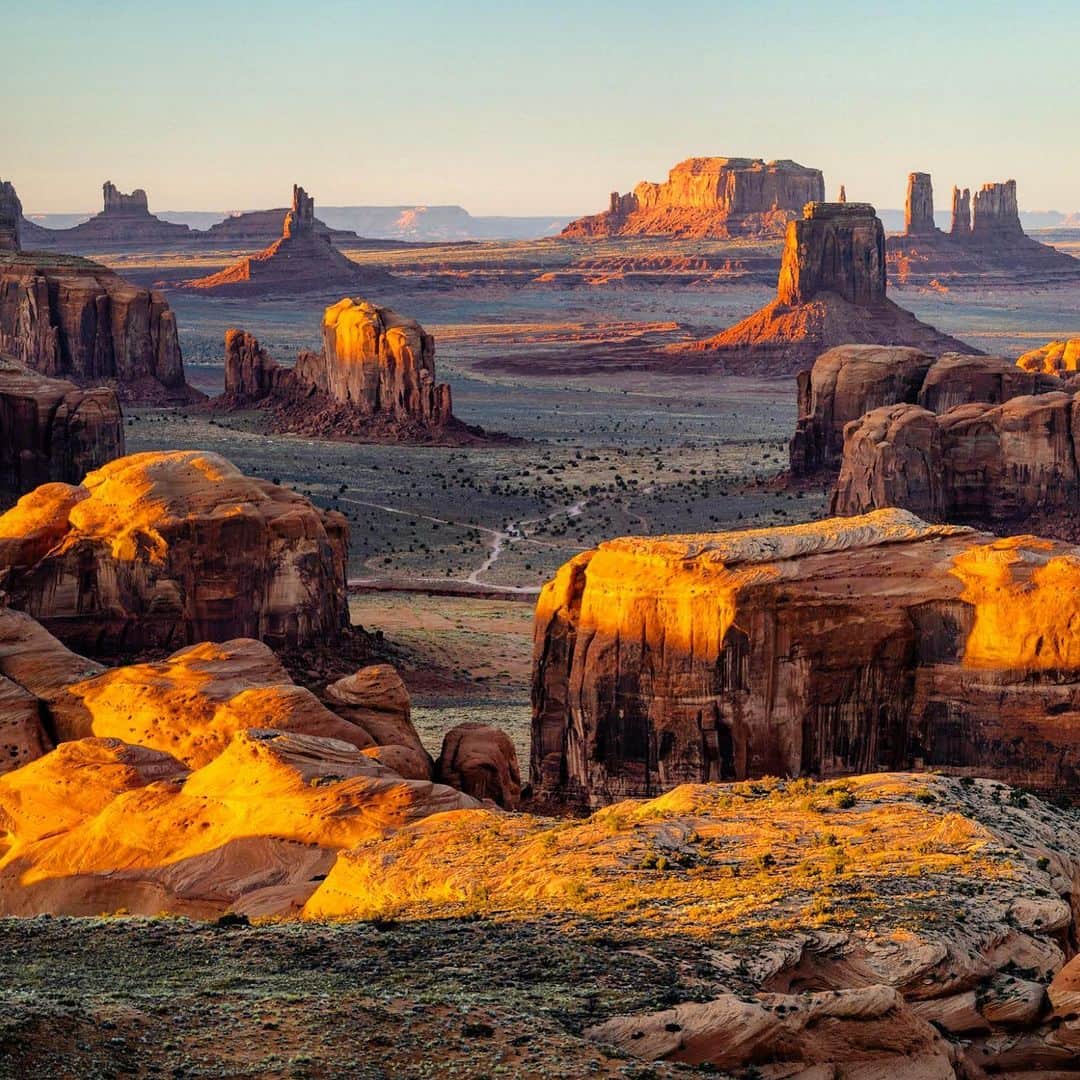 クリス・バーカードのインスタグラム：「The view from the Mesa will always be my favorite perspective of Monument Valley. Amazing how a bit of distance, some elevation & a compressed lens changes the landscape (70-200mm). It was a dream to work here with a talented crew on my last commercial assignment.  I currently am having my largest print sale of the year. 30% off all all sizes & mediums... just use the code GIVING30 at checkout. 🤙www.ChrisBurkard.com」