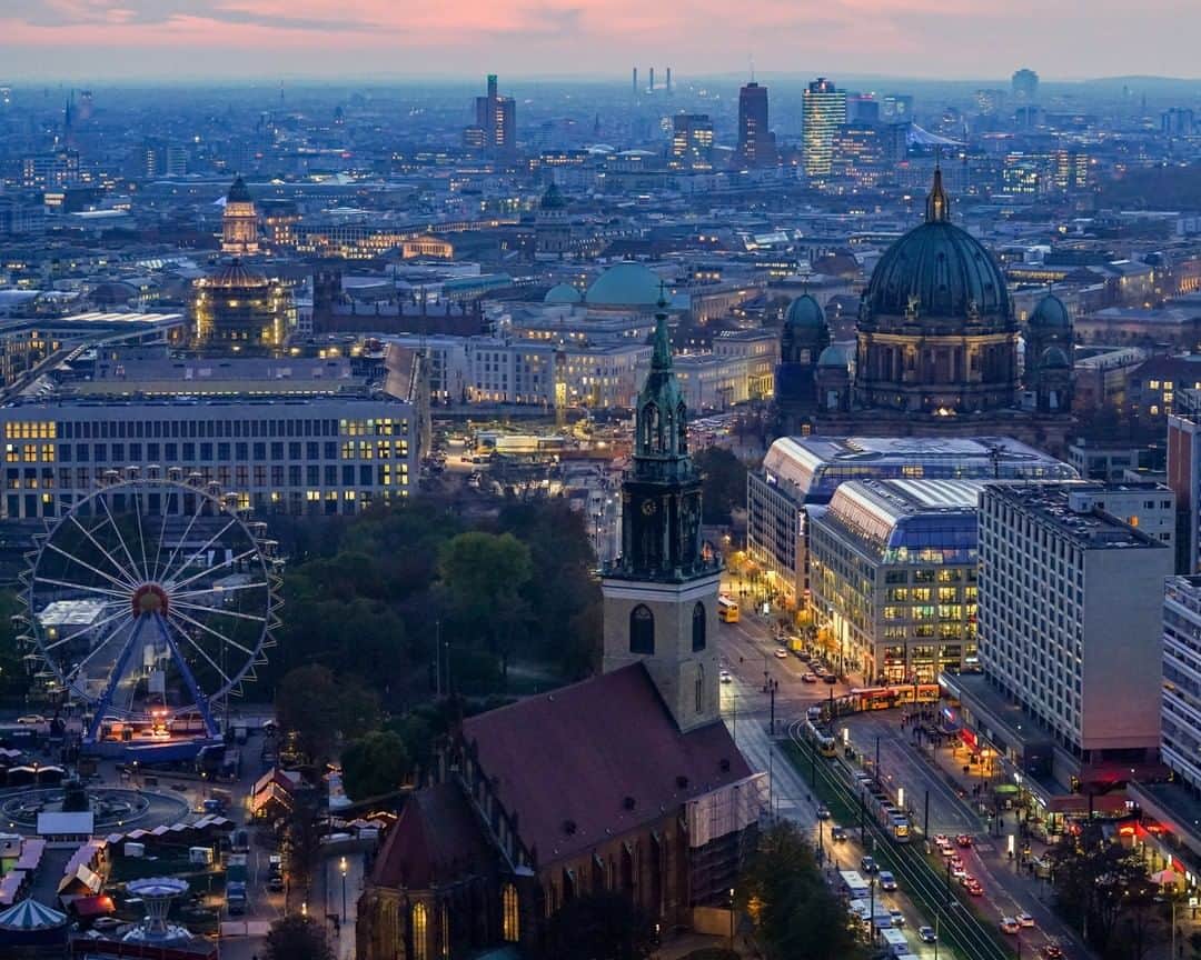 National Geographic Travelさんのインスタグラム写真 - (National Geographic TravelInstagram)「Photo by @ErikaSkogg | The blue hour envelops the capital city of Berlin, Germany. As a travel photographer, I love the cool tones and dramatic lighting of the autumn months throughout the north. With shorter days, the sun never quite rises high enough for harsh shadows, and the sunrises and sunsets seem to last forever. Dusk comes early in Germany this time of year, so there is plenty of time to hang out with your tripod along the rooftops and enjoy the sparkling city light up below you. #Germany #Berlin」11月28日 22時08分 - natgeotravel