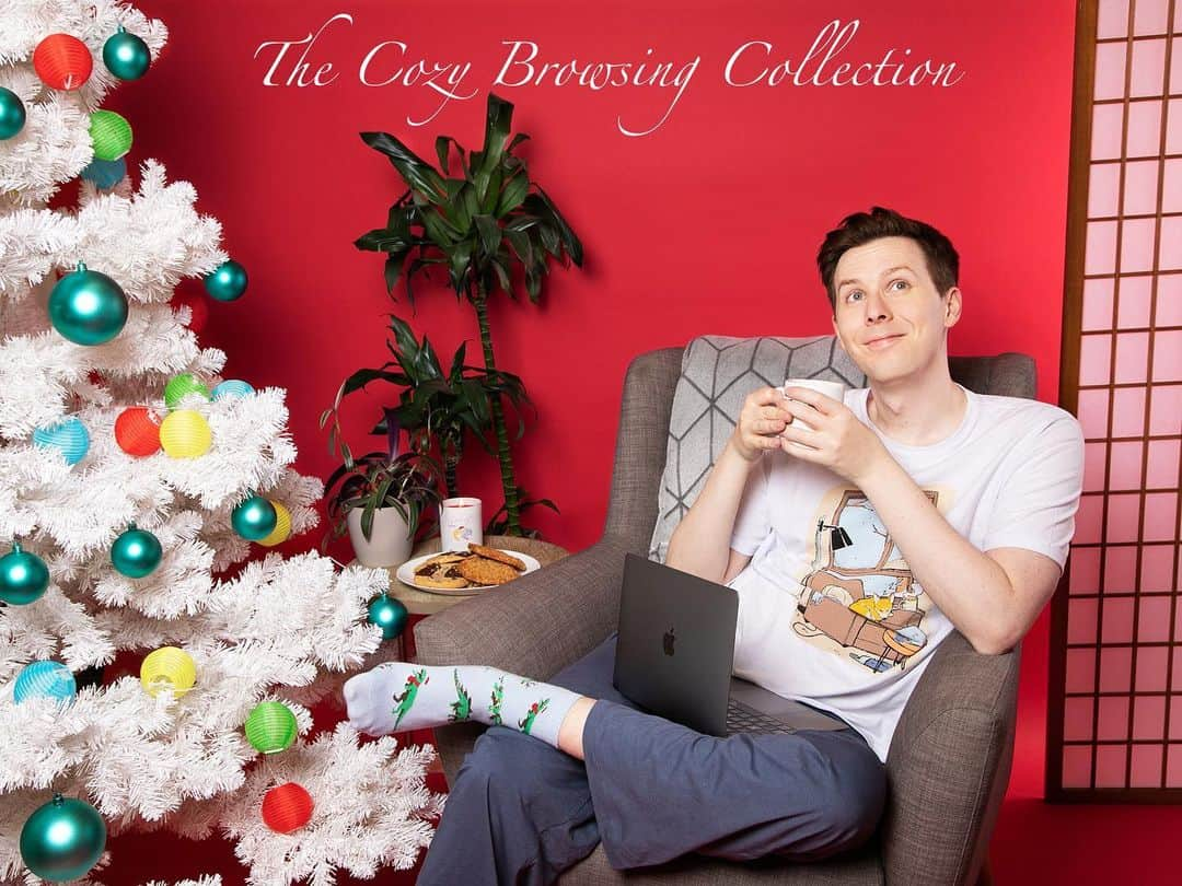 フィル・レスターのインスタグラム：「The Dan and Phil shops have combined for the festive season and I’m excited to share with you my cozy browsing collection!  Featuring comfy pyjamas in collab with @cyarine, a festive candle, my very own hot chocolate blend and some slightly odd dinosaur socks! 😊🕯💤☕️ Use code BLACKFRIDAY for 10% off!  danandphilshop.com」