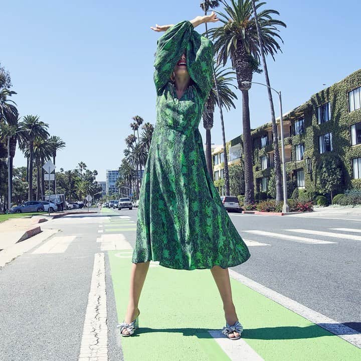 Saks Fifth Avenueのインスタグラム：「Stop traffic this Saturday in @rotate’s python-print wrap dress. #SaksStyle」