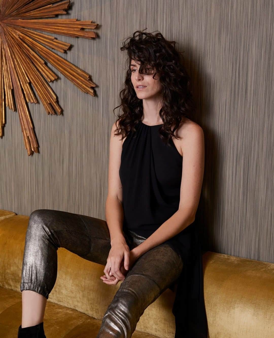 ホルストンのインスタグラム：「Think wistfully about how quickly the year's gone by in the really chic metallic suede leggings you never knew you always needed. And psst - they're 30% off during our Black Friday event.」