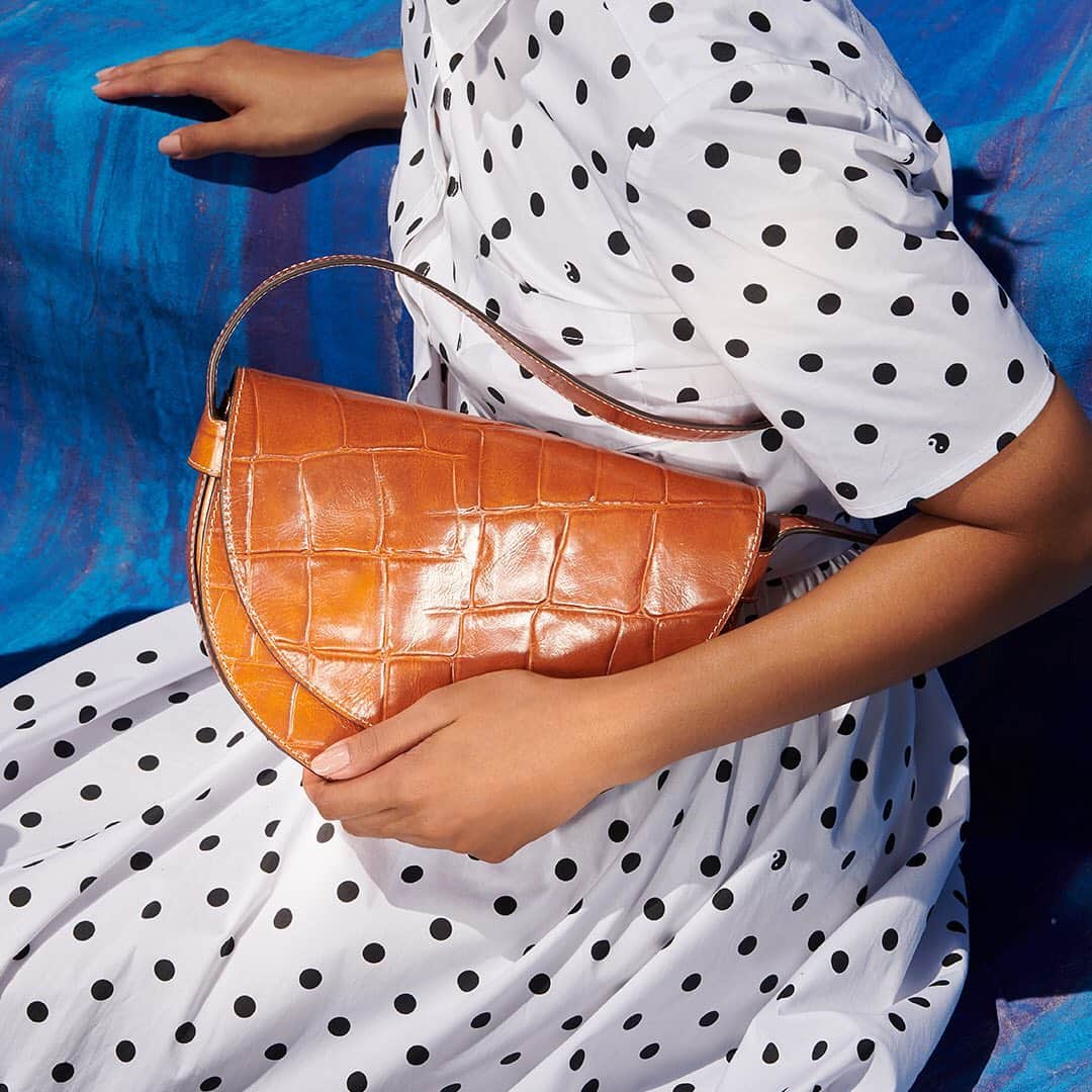 Saks Fifth Avenueのインスタグラム：「HANDBAG HEROES: @staud.clothing is delivering ‘90s-inspired sleekness via their mini shoulder bag with croc embossing. What will you stash in yours? #SaksStyle」