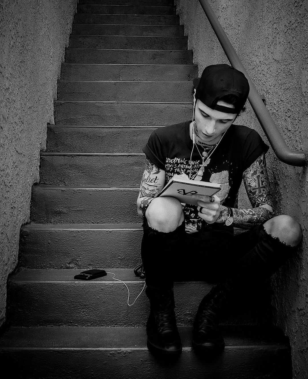アンディー・ビアーザックのインスタグラム：「Behind the scenes studio photo @fatpogarty took during the writing process for #thenight . I have started a new notebook for each record we have done since WSTW and this was the first day with this one. In the margins I tend to sketch various iconography and doodle symbols and characters that represent (in my mind at least) parts of the lyrics, for this one I started simply with our logo. I can’t thank you enough for your support of the new songs, it feels so good to be working on new BVB material, lots more to come 🆎🖤」