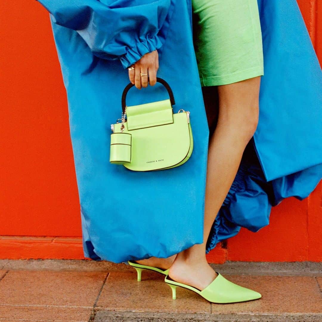 CHARLES & KEITHさんのインスタグラム写真 - (CHARLES & KEITHInstagram)「This winter, put together a fun and striking look with colour-coordinated accessories in neon yellow. Tap to shop now.  #CharlesKeithFW19 #ImwithCharlesKeith  Products featured:  Pointed toe mules and mini top handle saddle bag」12月4日 19時00分 - charleskeithofficial