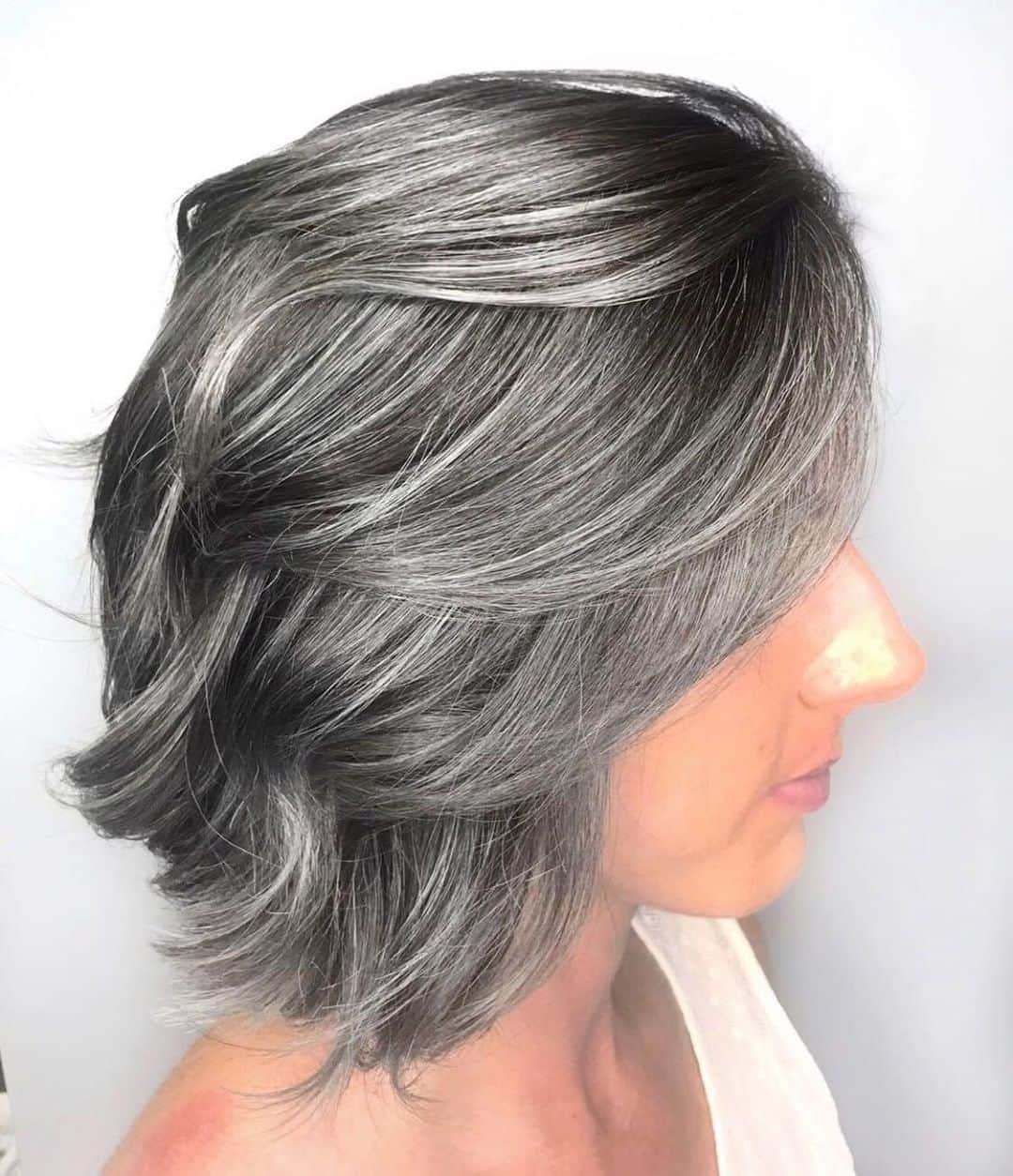 CosmoProf Beautyさんのインスタグラム写真 - (CosmoProf BeautyInstagram)「Embrace your natural #greyhaircolor 🌪️⁣ ⁣ Hair by @megnaomihair using all @joico color 🖤⁣ ⁣ PROCESS:⁣ 1️⃣ Heavily hi-lighted through her previous color to a level 9 with Joico #BlondeLife ⁣ 2️⃣ Pre-toned with Joico #Lumishine Demi Liquids 9V+Clear+7SB+5 Volume ⁣ 3️⃣ @joicointensity overlay formulas using Titanium alternating panels with Pewter ⁣ Color tools - @framar💞⁣ Styling tools - @oliviagardenint⁣ ⁣ Find the full #OliviaGarden collection including their NEW Plaid Tools at #cosmoprofbeauty where you are #licensedtocreate⁣ ⁣ #repost #greyhairtrend #joicointensity #grayhair」12月6日 9時15分 - cosmoprofbeauty