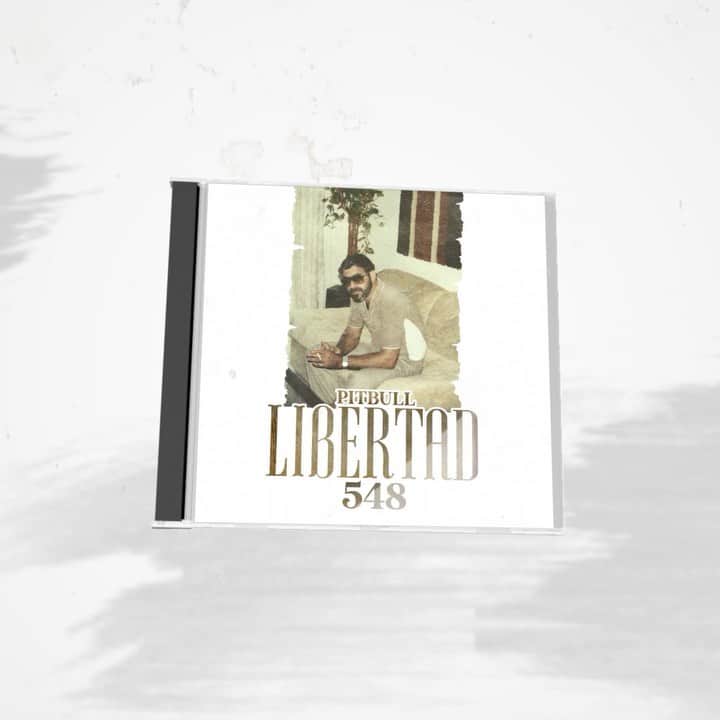 ピットブルのインスタグラム：「#Libertad548 is now available on CD and features two BRAND NEW tracks, “Ocupado” and “Cantare.” Don’t miss out - get your copy today along with an exclusive Popsocket and t-shirt design! Link in bio!」