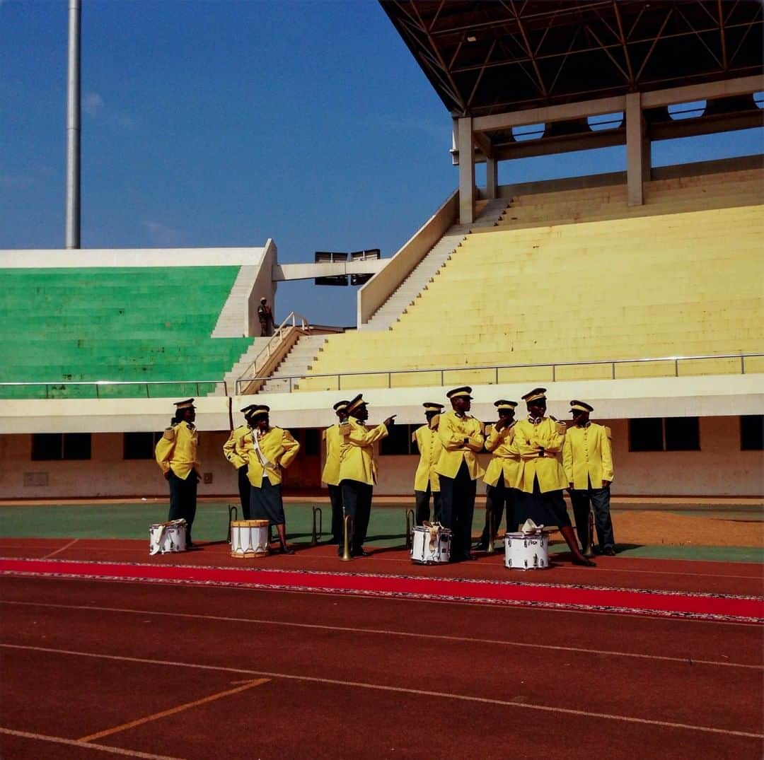 ナショナルジオグラフィックさんのインスタグラム写真 - (ナショナルジオグラフィックInstagram)「Photo by @michaelchristopherbrown | At a stadium in Bangui, Central African Republic, in 2014, band members wait along with ministers and others for the arrival of Catherine Samba-Panza, then the republic's interim president. Despite having substantial resources such as uranium, crude oil, gold, diamonds, cobalt, lumber, and hydropower, as well as significant quantities of arable land, the Central African Republic had the lowest GDP per capita in the world in 2017.」12月13日 16時39分 - natgeo