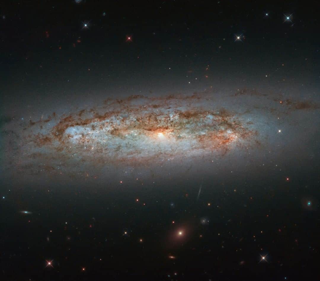 NASAさんのインスタグラム写真 - (NASAInstagram)「A galaxy's dazzling display 🌀  NGC 3175 is located around 50 million light-years away in the constellation of Antlia (the Air Pump). The galaxy can be seen slicing across the frame in this image from @NASAHubble. Its bright patches of glowing gas, dark lanes of dust, bright core, and whirling, pinwheeling arms come together to paint a beautiful celestial scene.  Credit: ESA/Hubble & NASA, D. Rosario et al.」12月16日 1時00分 - nasagoddard