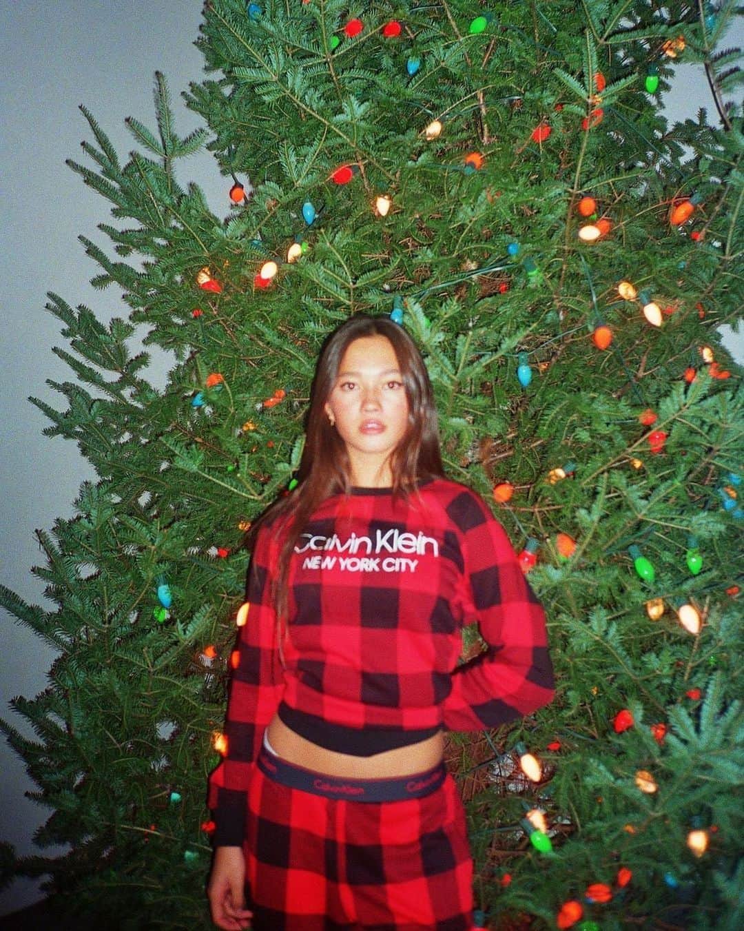 Calvin Kleinさんのインスタグラム写真 - (Calvin KleinInstagram)「#CKHOLIDAY Festive ✨@lilychee lights up in our #ModernCotton Buffalo Check pajama set. ⁣  What's your #Holiday style? Show us ▷ ⁣  Explore the #CALVINKLEIN gift guide at calvinklein.com:  Modern Cotton Lounge Buffalo Check Sweatshirt [GLOBAL]  Modern Cotton Lounge Buffalo Check Joggers [GLOBAL]」12月16日 4時57分 - calvinklein