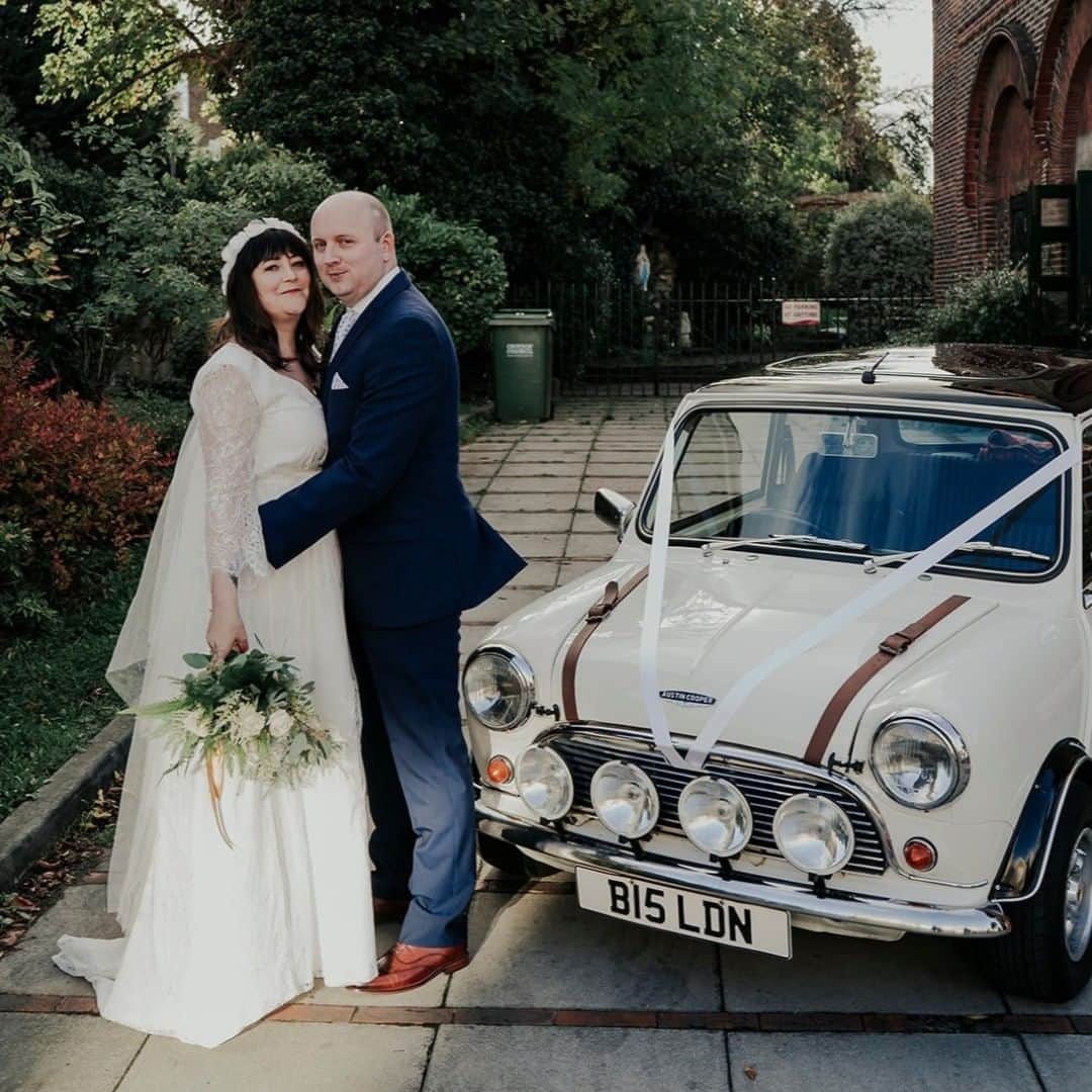 ミナのインスタグラム：「She wore the sweetest shoes ever and their cake was decorated with succulents! 😍 “I wanted a vintage style dress that would work with my tattoos. As soon as I visited Miina at Indiebride London, I knew I’d found the home of my dress! Her studio is based in an old church in Brixton, South London – it’s so charming. The whole process was so easy, and Miina was so relaxed and helpful.” Congratulations Catherine and Andy! ❤️ Their wedding is now featured on Love My Dress. Link in bio.  P.s. We have discontinued the dress Catherine is wearing and selling the sample that fits brides sized 10-12. Get in touch if you would like to try it on 😊  Picture by @ joasis_photography  #realwedding #realbride #londonwedding #pubwedding #laidbackwedding #autumnwedding #weddingstory #indiebridelondon #indiebride #lovemydress #alternativewedding #weddings2020 #weddinginspiration #weddings #ethicalweddingdress #sustainablewedding #sustainableweddingdress #handmadeweddingdress #ethicalwedding #handmadeweddingdress #vintageinspiredweddingdress #londonbride #morrismini #weddingmini #weddingcar」
