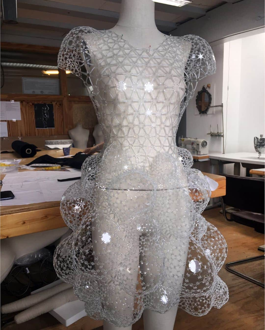 Iris Van Herpeさんのインスタグラム写真 - (Iris Van HerpeInstagram)「Our first collaboration with visionary architect Philip Beesley was for our ‘Voltage’ collection back in 2013. Since the debut of Voltage Iris van Herpen and Philip Beesley have been collaborating on numerous transcending material innovations. We here illuminate a selection of our treasured ongoing collaboration. "I remember that in our very first exchanges Iris and I spoke of things at the far edges of perception ~ of floating and diving and of radiant halos. Our ongoing work together lives on those edges. The insight I've gained from our shared work has transformed how I approach my own craft. Perhaps this comes because Iris approaches Couture as intimate architecture, expanding the boundaries of skin and clothing into rippling, efflorescing octaves of space that reach outward, upward and downward without limit.“ Philip Beesley  Video 1: ‘Lucid' dress in movement, 2016  Image 2: Atelier process photo of the ‘Lucid’ dress, 2016 Video 3: ‘Galactic glitch’ dress in movement, 2019 Image 4: ‘Magnetic Motion’ dress, Mathieu Cecar, 2015 Video 5: ‘Lucid’ shoulder dress in movement, 2019 Image 6: ‘Aeriform’ dress, 2017 Video 7: ‘Glitch’ dress in process inside the atelier, 2017 Image 8: ‘Voltage’ dress in movement, 2013 Image 9: ‘Voltage’ dress, detail photo, Bart Oomes, 2013 Image 10: ‘Omniverse’ dress, Julien Vallon, 2019  #irisvanherpen #philipbeesley」12月19日 22時02分 - irisvanherpen