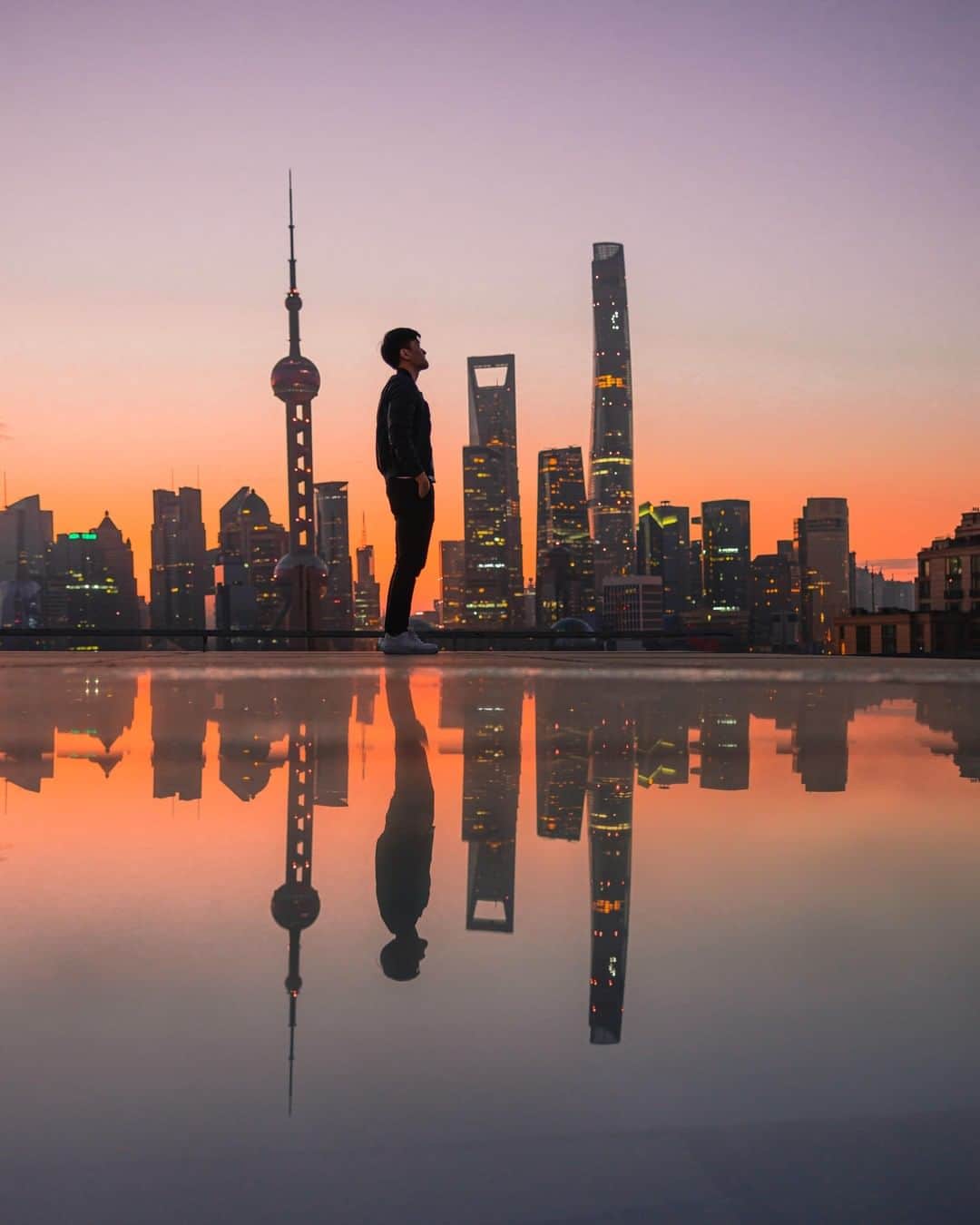 Canon Asiaのインスタグラム：「Notice something different about the Shanghai skyline? 🤔 Photography is all about perspective and the creative 🌈 possibilities are endless when you experiment with it! ⁣ ⁣📷 Image by @jimchanfc shot using the Canon EOS R | Canon RF 28-70mm f/2L IS USM | f/2 | 1/25s | ISO 500 | 31mm ⁣ ⁣Want your photos to be featured too? Tag them with #canonasia or submit them on My Canon Story, link in bio! ⁣ ⁣#canonasia #photography #shanghai #china #sunrise #sunrisephotography #reflection #reflectionphotography #perspectives」